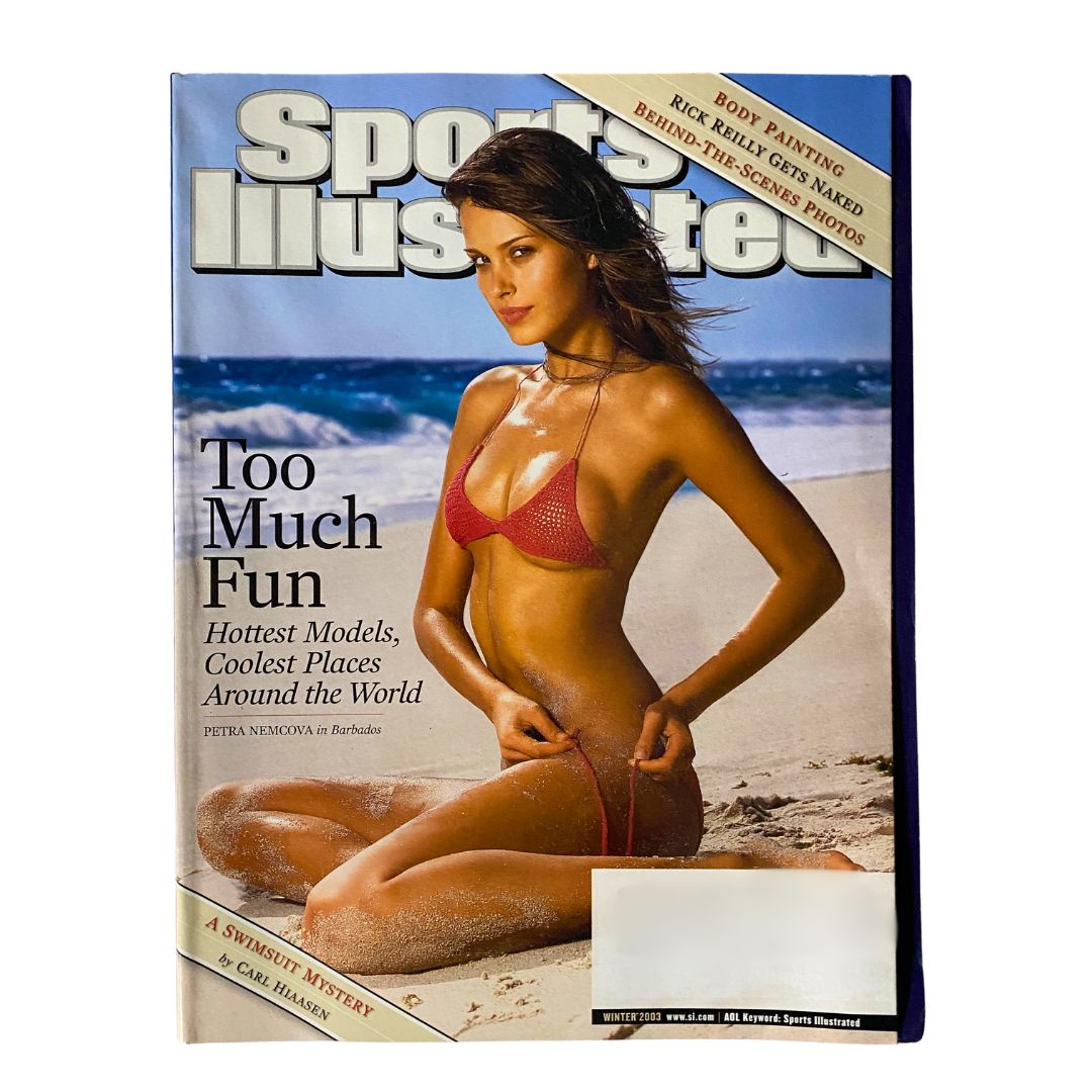 Cover of Sports Illustrated Magazine Winter 2003 featuring Petra Nemcova in a bikini against a tropical backdrop in Barbados, highlighting beauty and fashion.