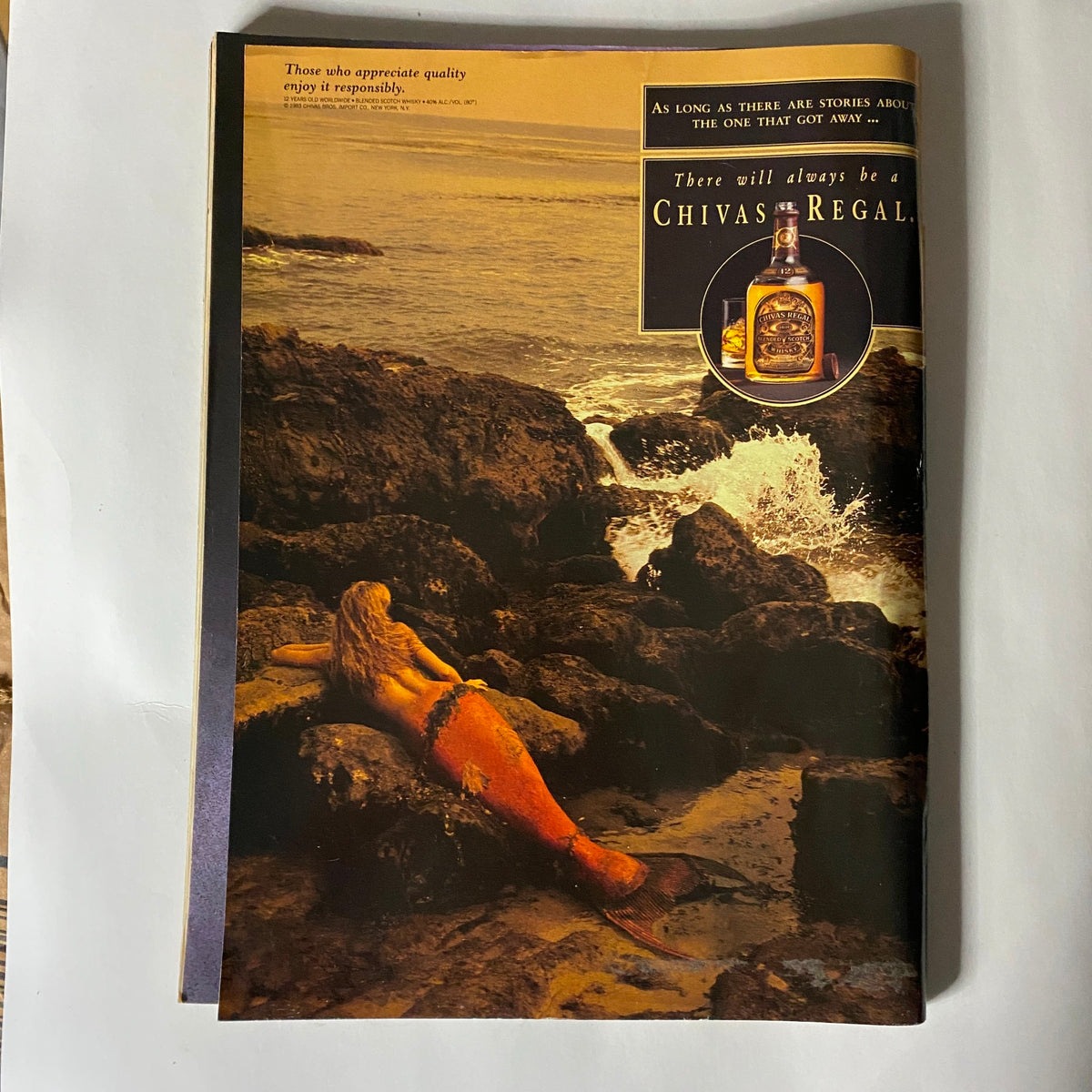 Advertisement from Sports Illustrated magazine February 14, 1994, showing a mermaid relaxing on the rocks with Chivas Regal branding, embodying the creative advertisements of the era.
