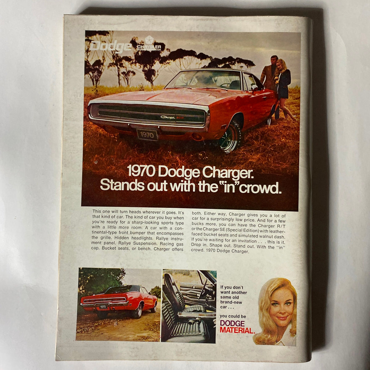 VTG Playboy Magazine December 1969 advertisement for the 1970 Dodge Charger, displaying the car and engaging copy promoting its features.