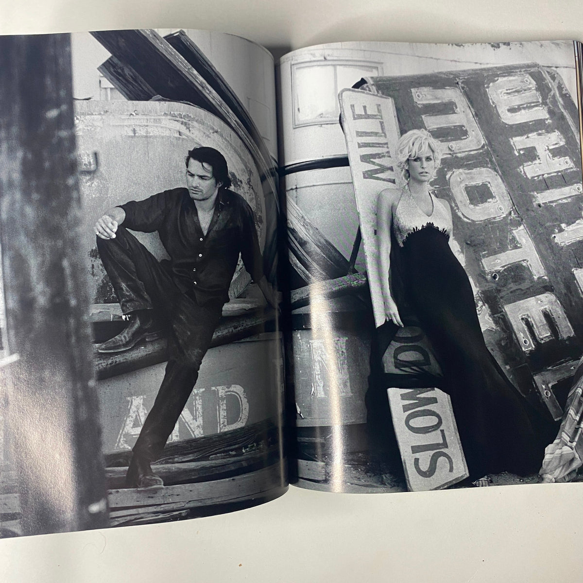 Interior spread from Vogue Magazine December 2004 showing a fashion shoot with models in striking black and white, emphasizing timeless style.