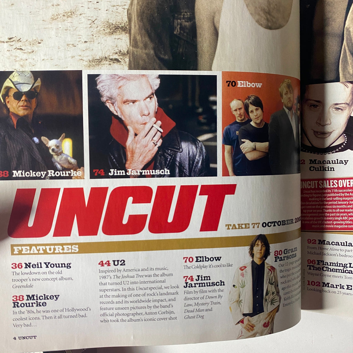 Uncut Magazine October 2003 features Mickey Rourke, Jim Jarmusch, Elbow, and Macaulay Culkin, highlighting cultural insights and music stories.