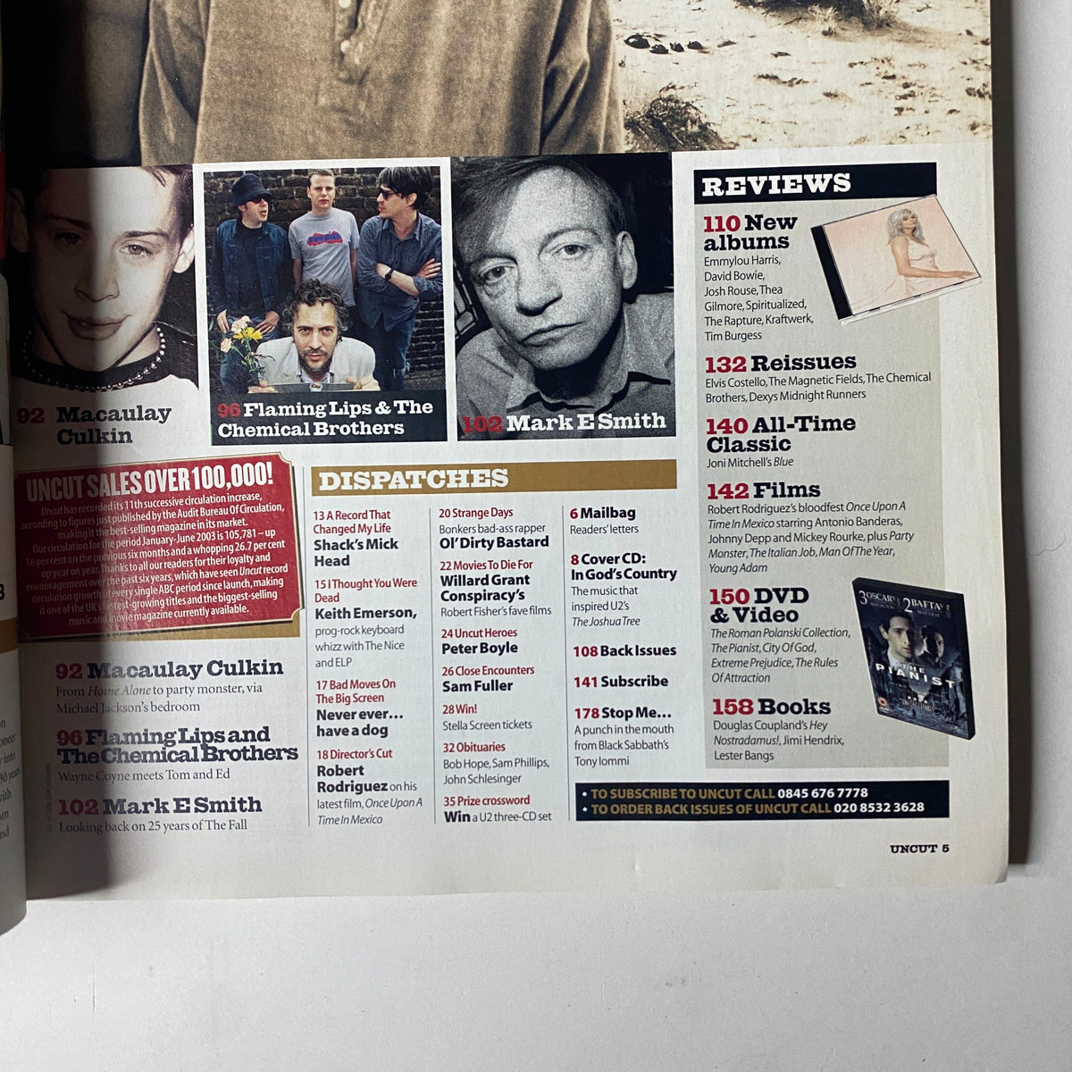 Uncut Magazine October 2003 includes reviews featuring Macaulay Culkin, Flaming Lips, The Chemical Brothers, and Mark E. Smith, showcasing the latest in music and film.