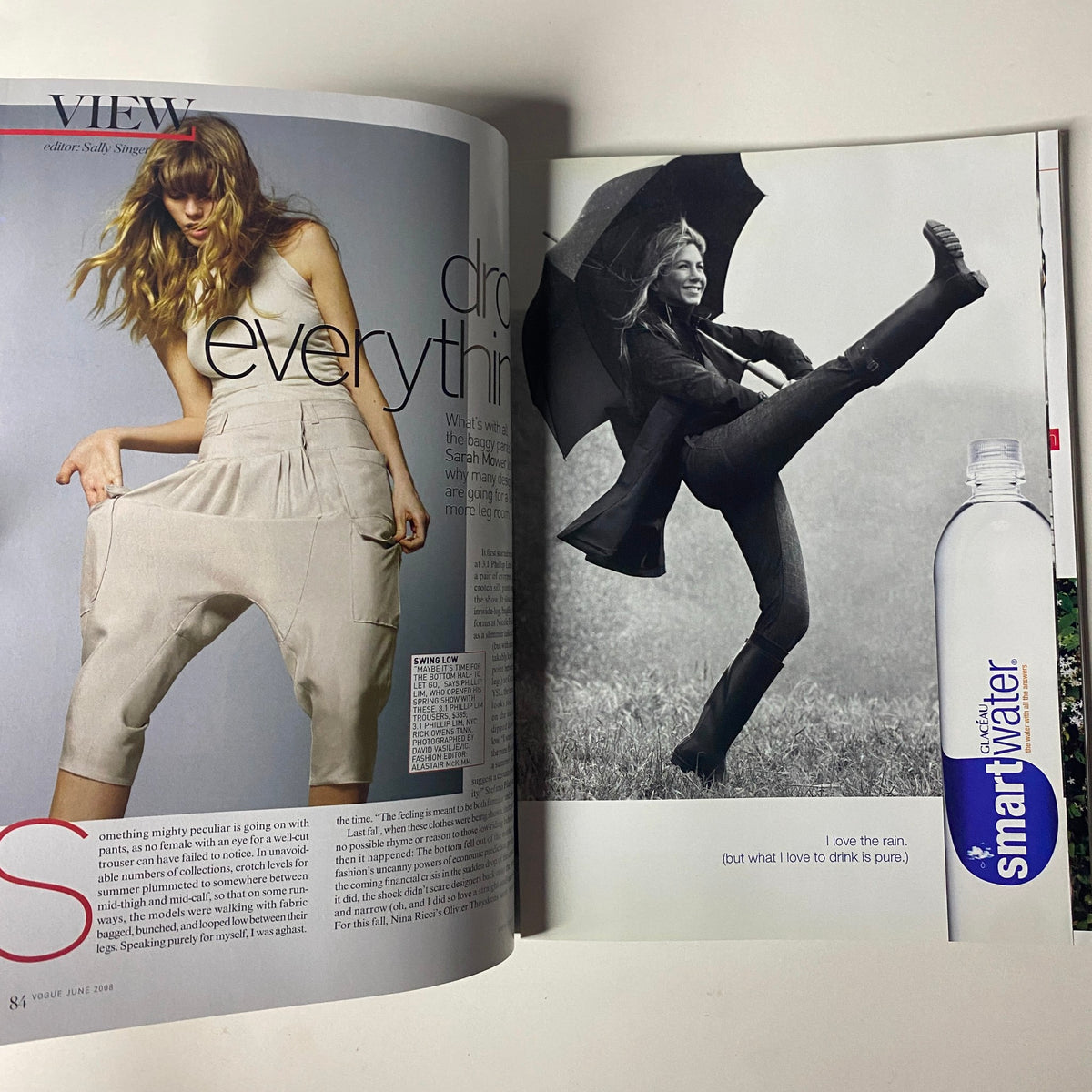 Fashion editorial spread from Vogue Magazine June 2008 featuring creative styling and a model in trendy outfits, showcasing contemporary fashion trends.
