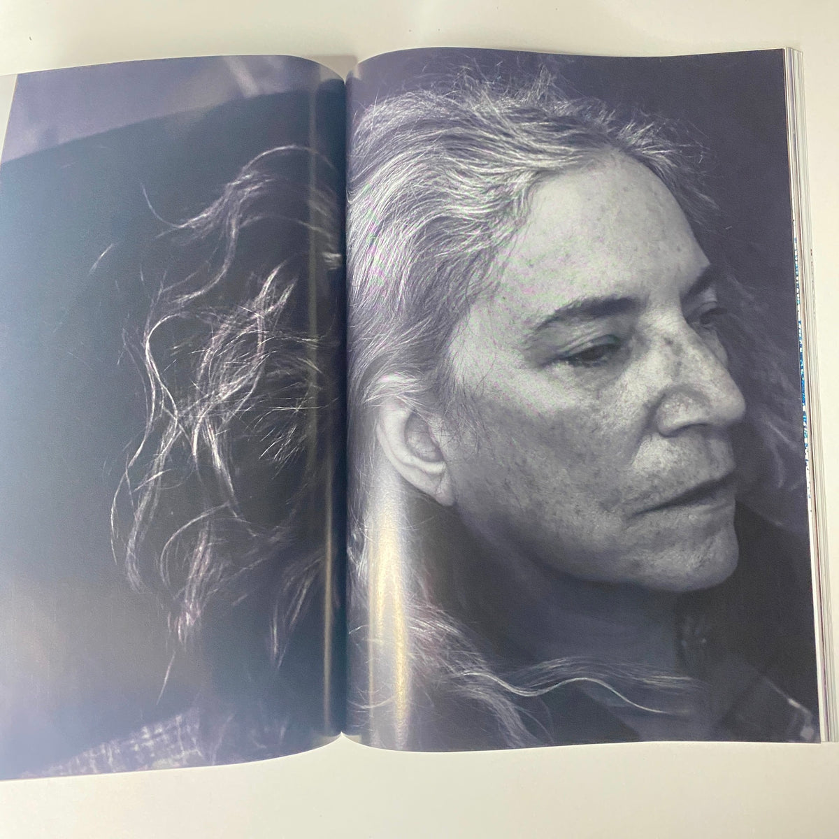 Portrait photo featured in Vogue Magazine November 2016 showing a close-up of a woman with gray hair, part of the features in the Emma Stone cover issue.