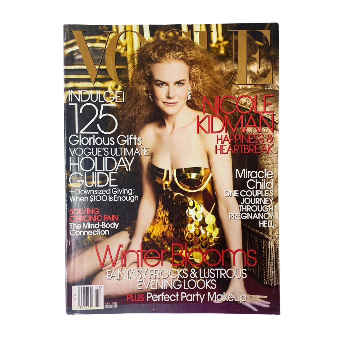 Vogue Magazine December 2006 featuring Nicole Kidman on the cover, showcasing a glamorous editorial theme with 'Winter Blooms' highlighted.
