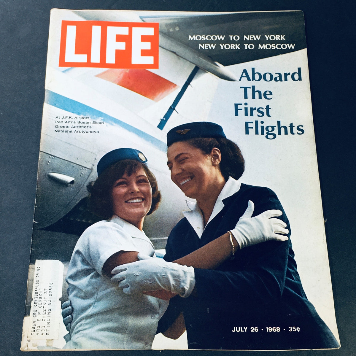 Vintage Life Magazine cover from July 26, 1968, featuring Pan Am flight attendant Susan Sicari greeting Natasha Arutyunova at JFK Airport. The magazine reflects the glamour of early air travel and the dynamic 1960s culture.