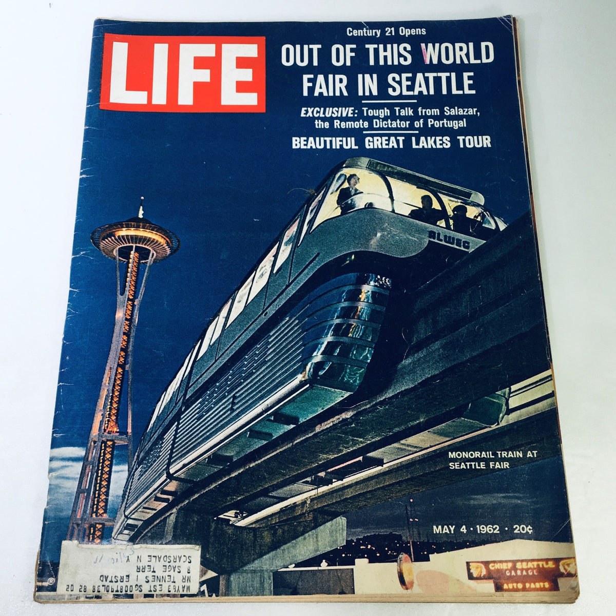 Vintage Life Magazine Cover from May 4, 1962 featuring the Monorail Train at Seattle Air Fair, showcasing the iconic Space Needle in the background and capturing mid-century American transportation history.