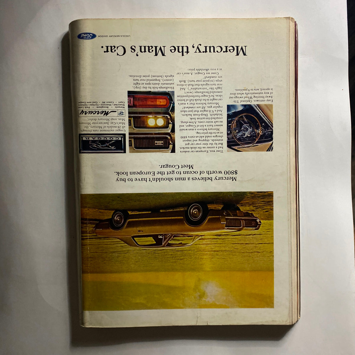 Back cover of Playboy Magazine December 1966, detailing Mercury cars with the title 'Mercury, the man's car.' Highlights vintage automobile advertisements from the 1960s.