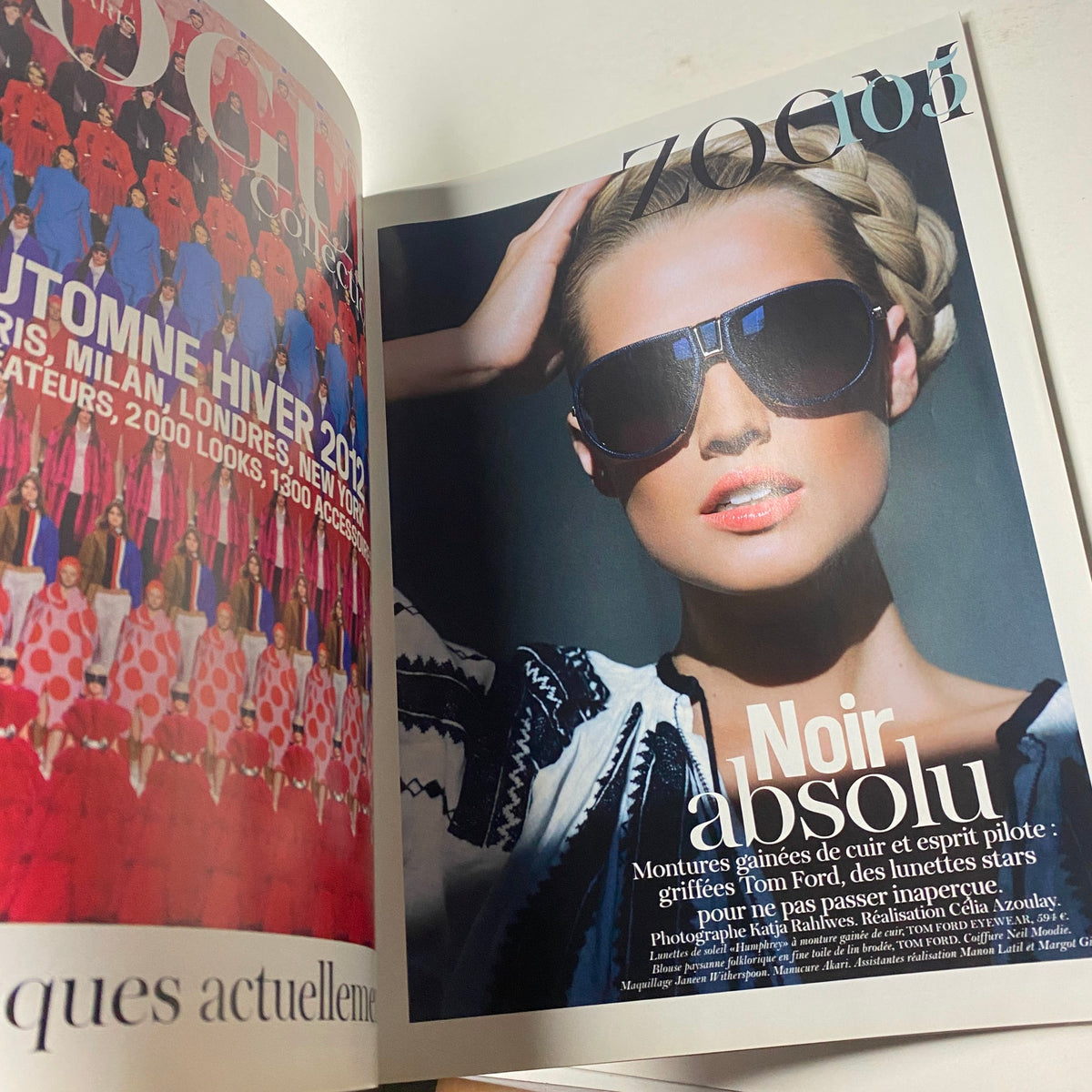 Inside editorial page of Vogue Paris Magazine June - July 2012 No. 928 highlighting high-fashion eyewear and styling, featuring an elegant model in a chic pose.