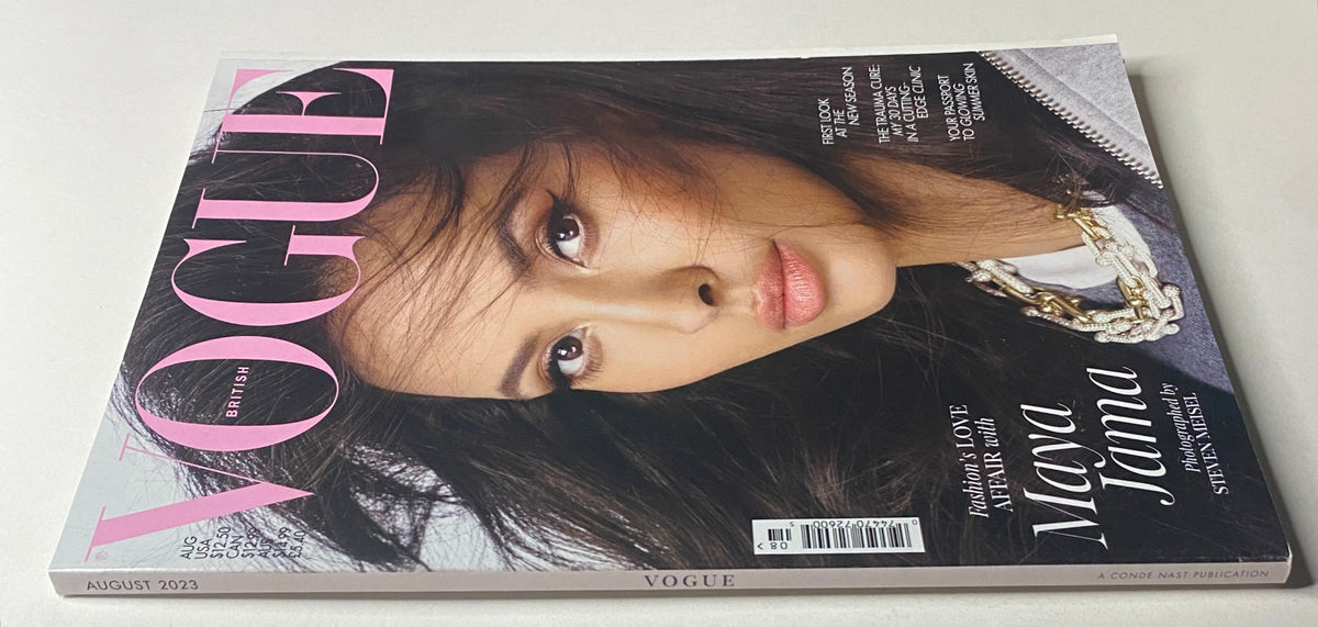 Vogue British Magazine August 2023 featuring Maya Jama on the cover, showcasing her impressive makeup and hairstyle against a stylish background.