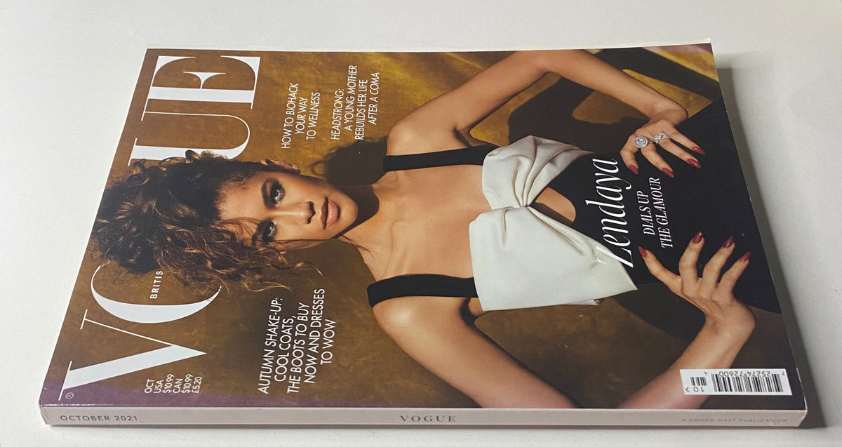 Back cover image of Vogue British Magazine October 2021 showcasing Zendaya, emphasizing her glamour and beauty, and featuring details on the magazine's content.