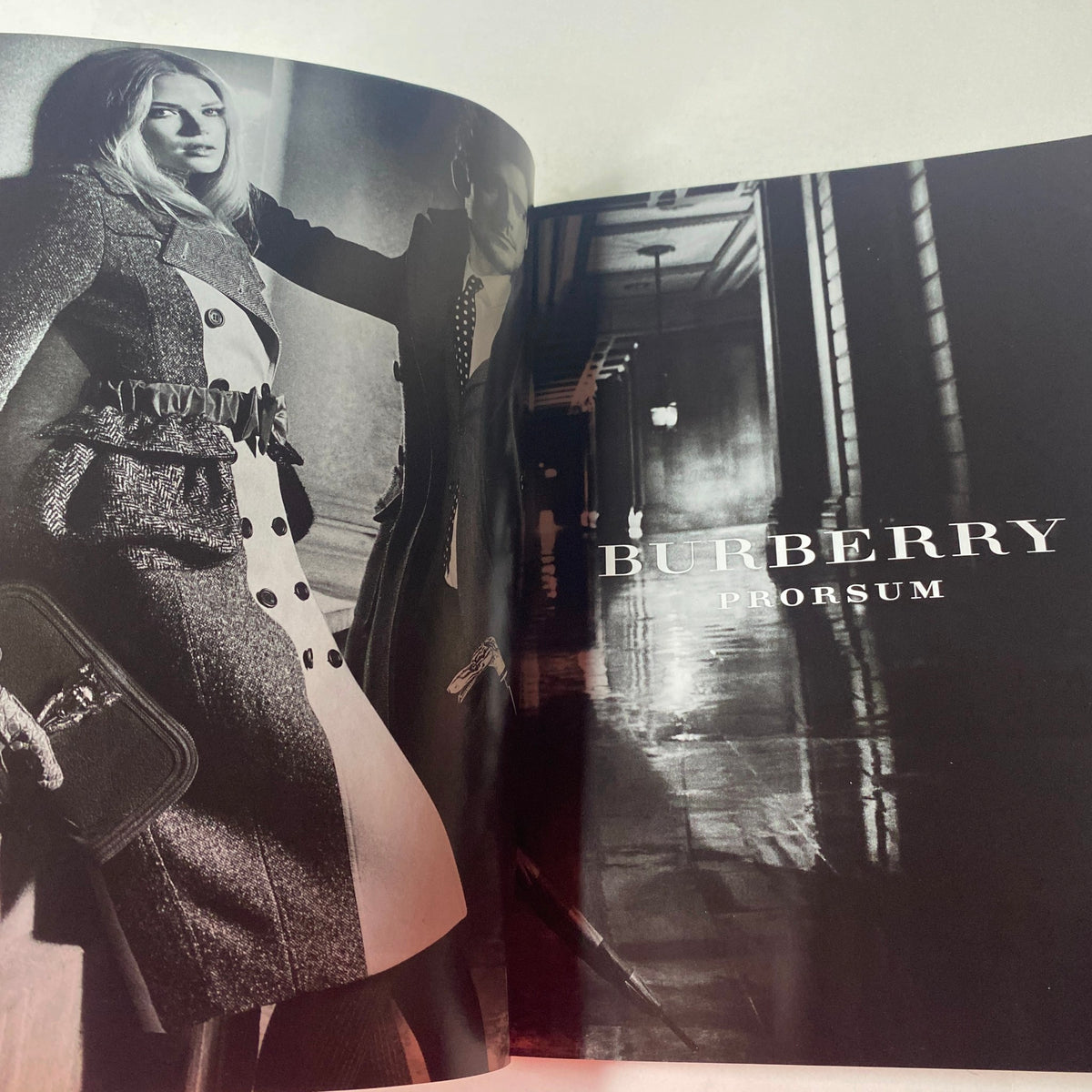 Vogue British Magazine July 2012 Rachel Weisz Cover advertisement for Burberry Prorsum featuring a model in striking fashion.
