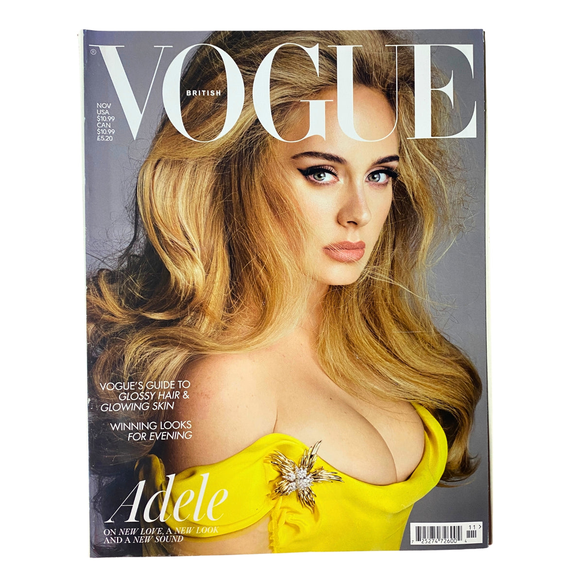 Vogue British Magazine November 2021 featuring Adele on the cover in a yellow gown, showcasing glamorous hair and makeup. Perfect for collectors and fans of Adele.