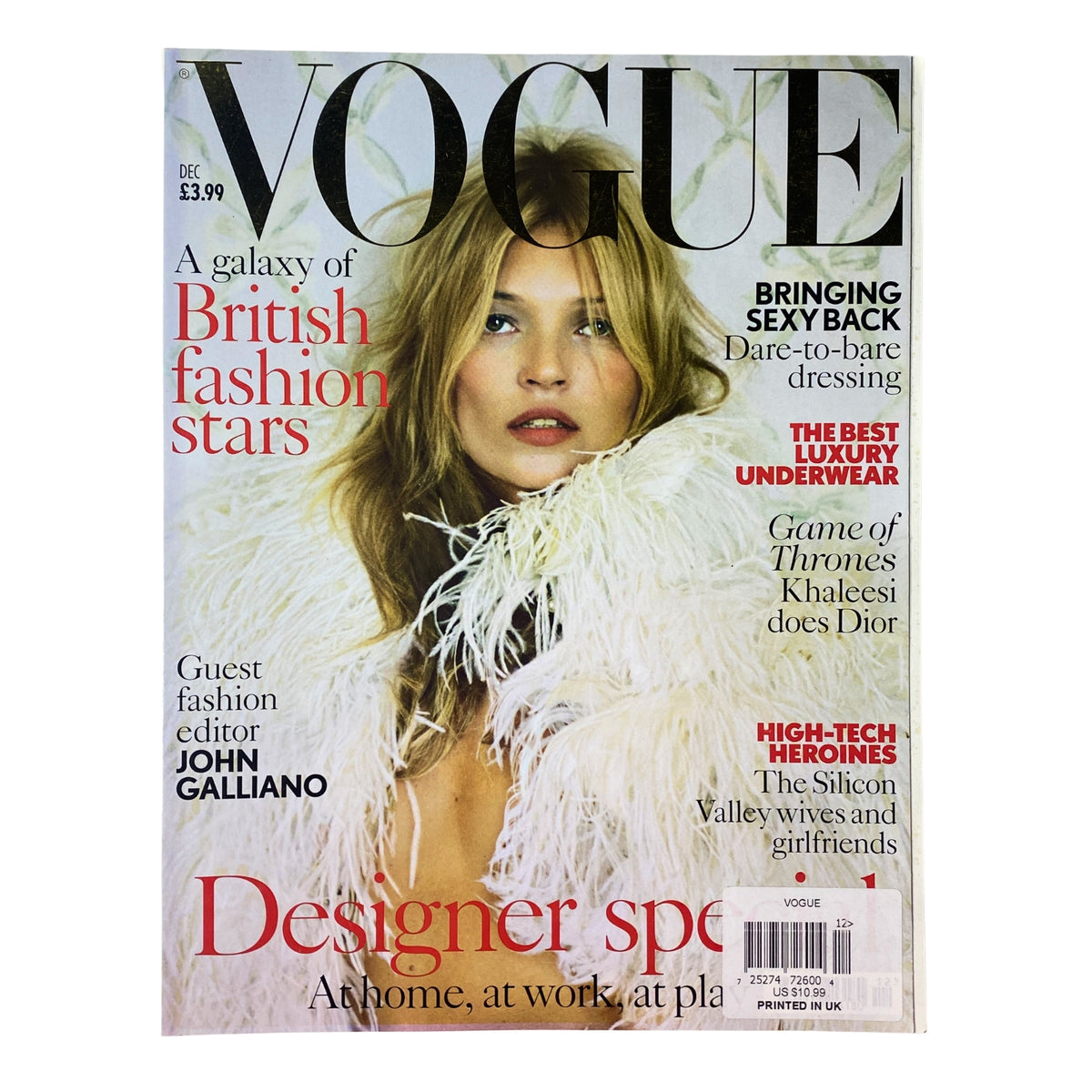 Vogue British Magazine December 2013 featuring Kate Moss on the cover, styled in luxurious Alexander McQueen with a feather shawl. This issue celebrates fashion trends and includes insights on notable icons.