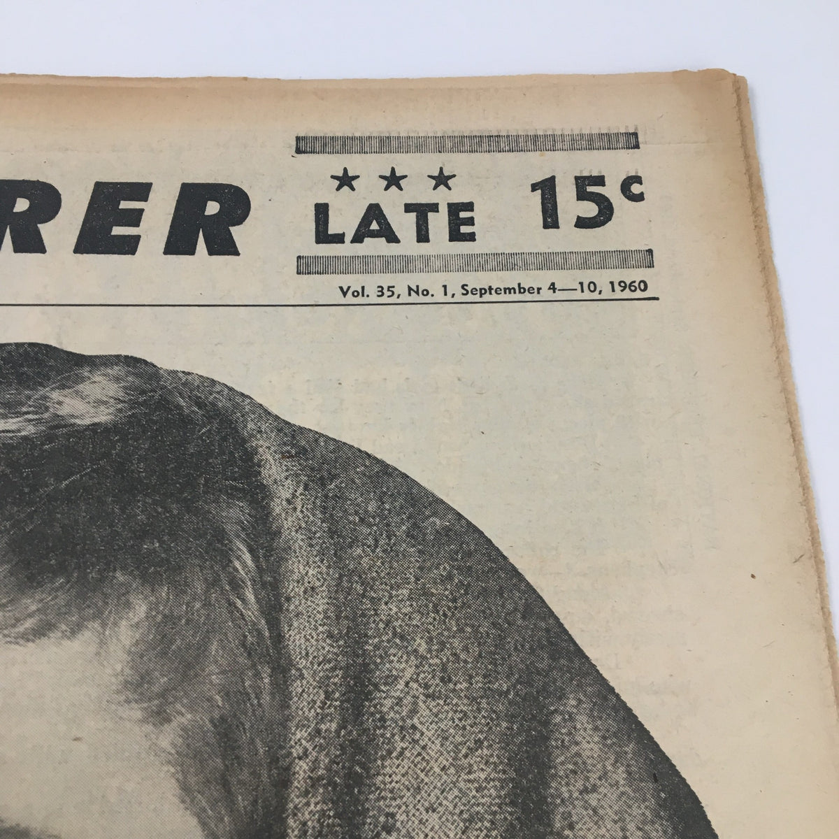 Detail shot of National Enquirer Paper September 4 1960 showcasing the publication's title and price, emphasizing its vintage charm.