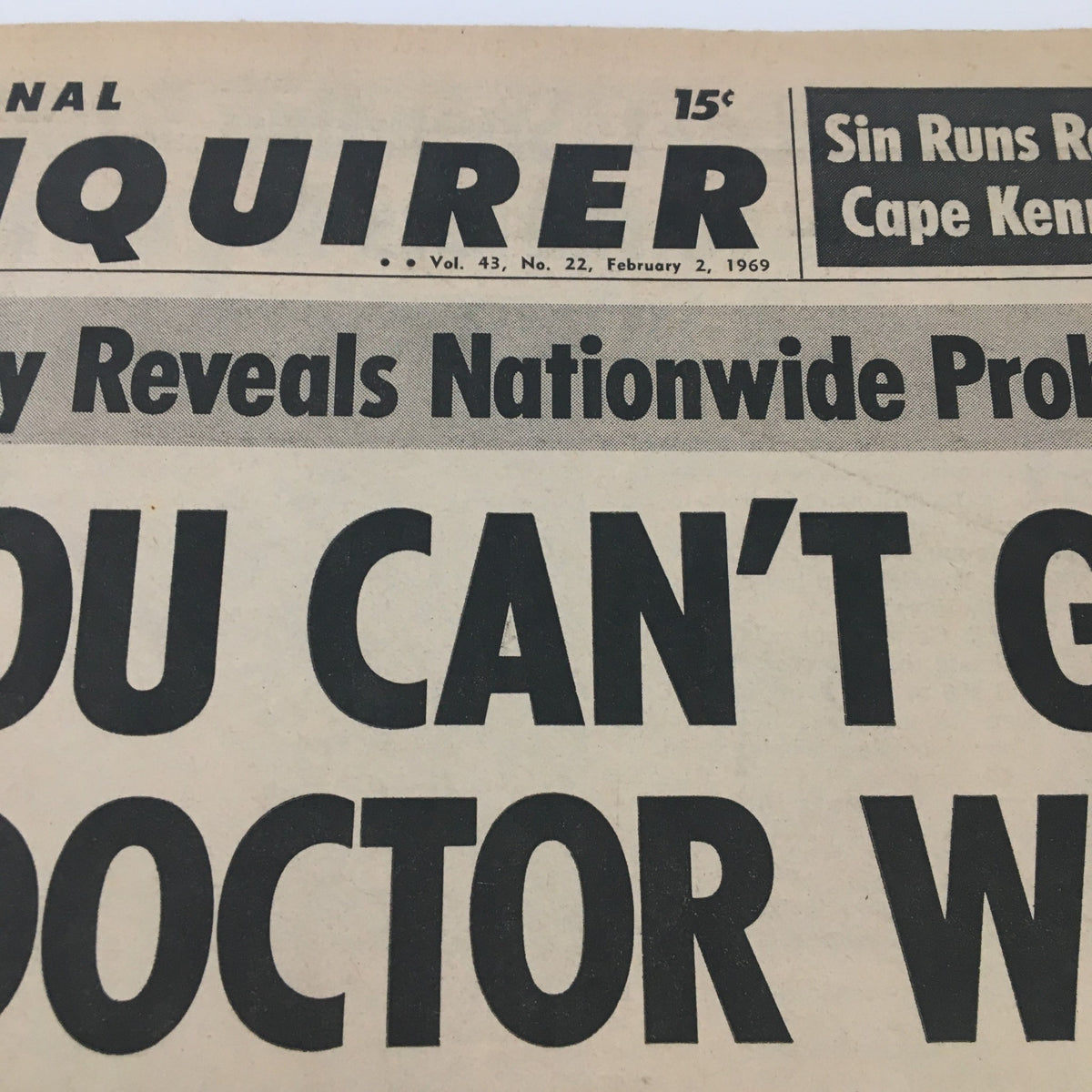 Close-up of the National Enquirer Newspaper February 2 1969 showing the bold headline 'Sin Runs Rampant in Cape Kennedy' and notable articles.