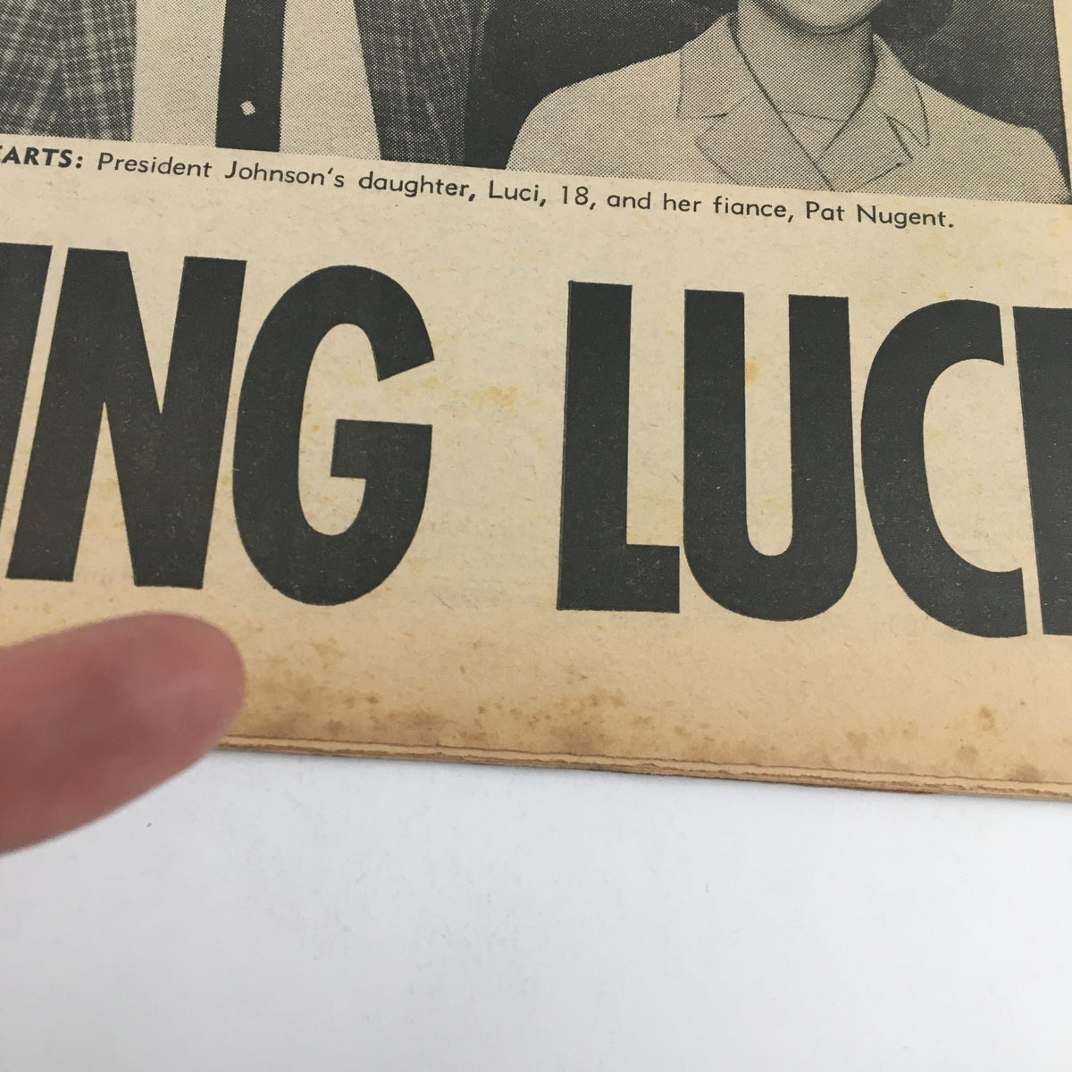 Detail of the National Enquirer Newspaper February 6, 1966 highlighting text about Luci Baines Johnson and her fiancé Pat Nugent.