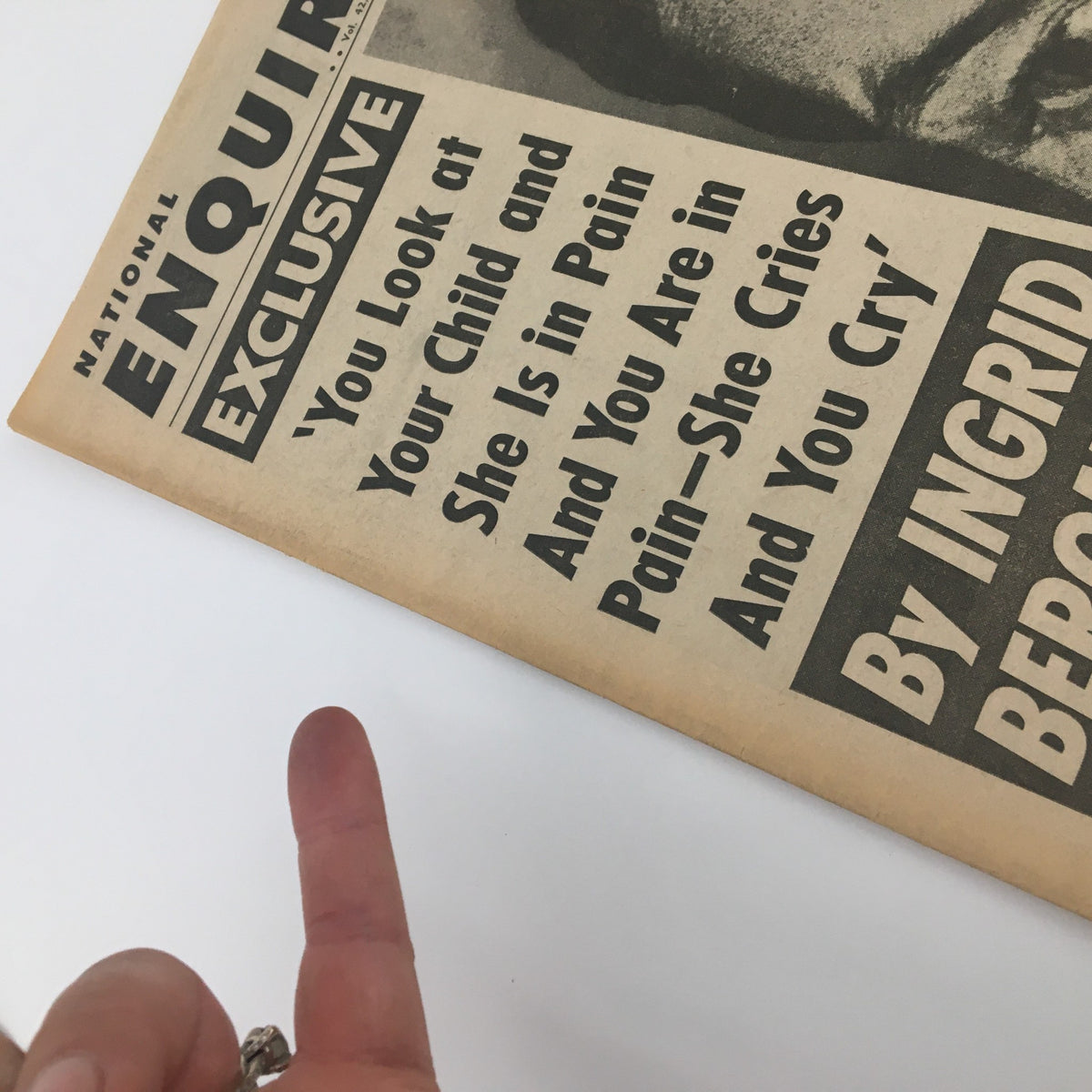 National Enquirer Newspaper August 4 1968, showcasing a close-up of the cover's edge with a finger pointing, emphasizing the dramatic headline about Ingrid Bergman.