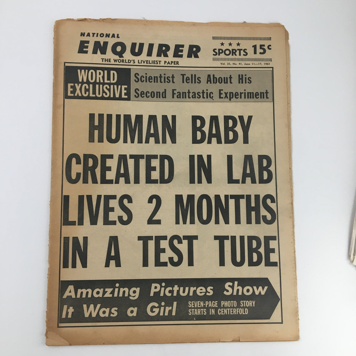Cover of the National Enquirer Newspaper dated June 11, 1961, featuring the headline 'Human Baby Created In Lab Lives 2 Months In A Test Tube'. The cover includes a bold title and a note about an amazing photo story.