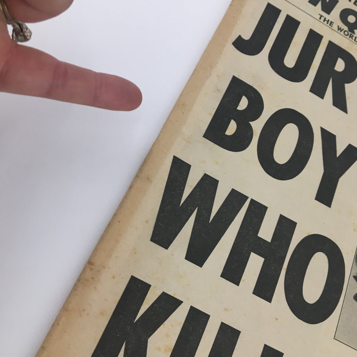 Close-up of the National Enquirer Newspaper cover from November 3, 1963, highlighting the headline 'Jury Frees Boy Who Killed His Brutal Dad' with hand gesture pointing to the text.