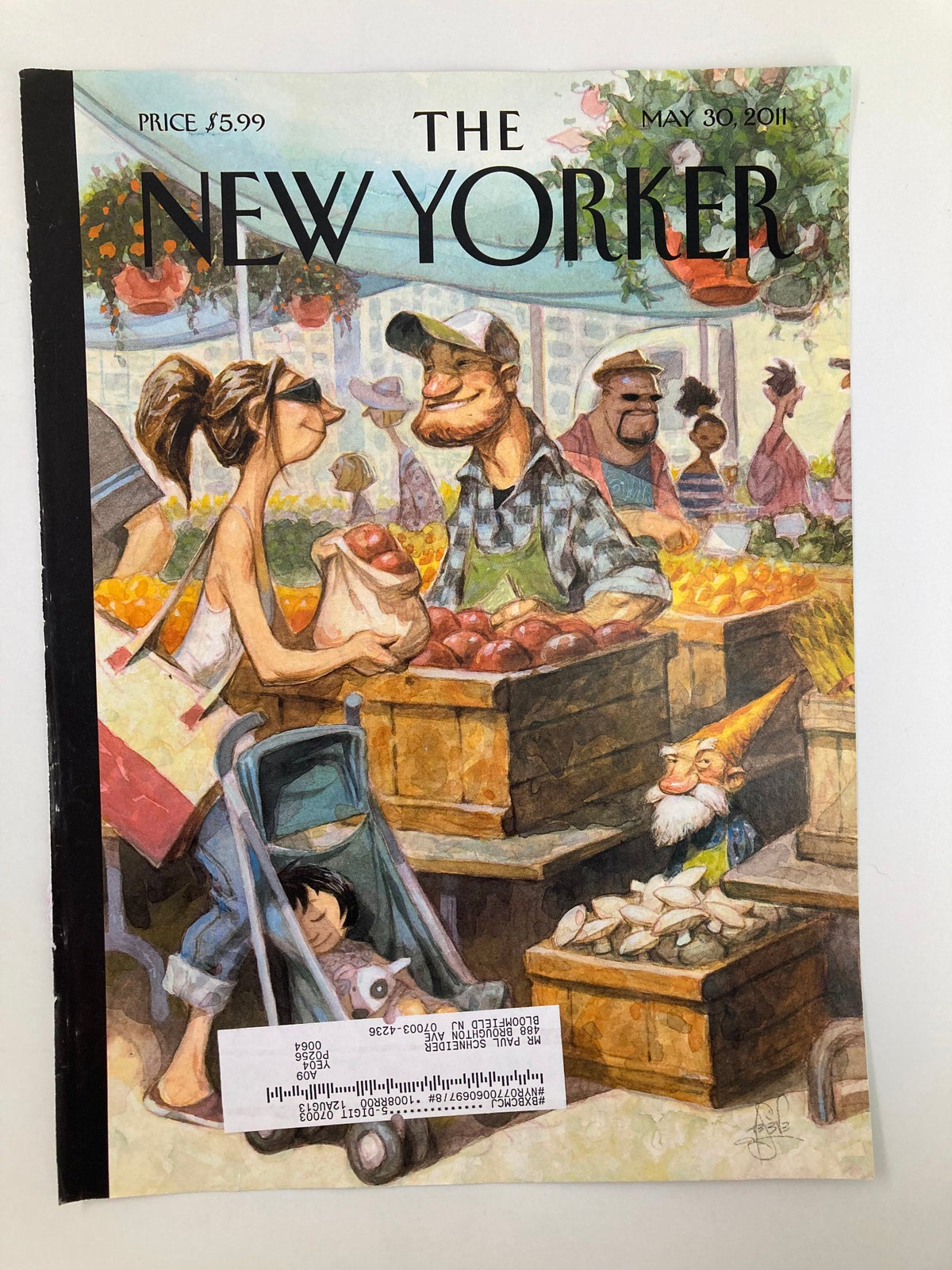 Front cover of The New Yorker, May 30, 2011, titled 'Small Growers' by Peter de Seve, depicting a lively market with people and a child in a stroller surrounded by stalls of fruits and vegetables.