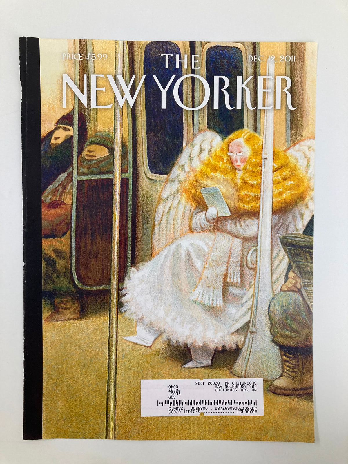 The New Yorker December 12 2011 cover showcasing "Subway Angel" by Carter Goodrich, illustrating a whimsical scene of a serene angel reading among subway passengers, reflecting the creativity of New York City.