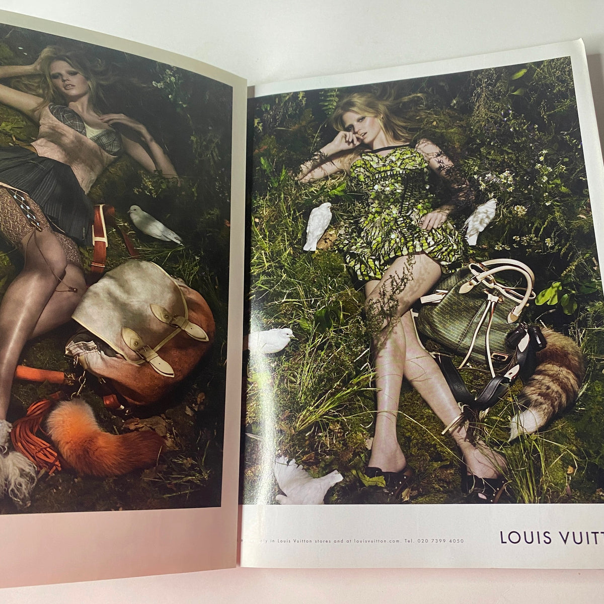 Vogue British Magazine March 2010 showcasing a Louis Vuitton advertisement with a model lying in a natural setting surrounded by wildlife.