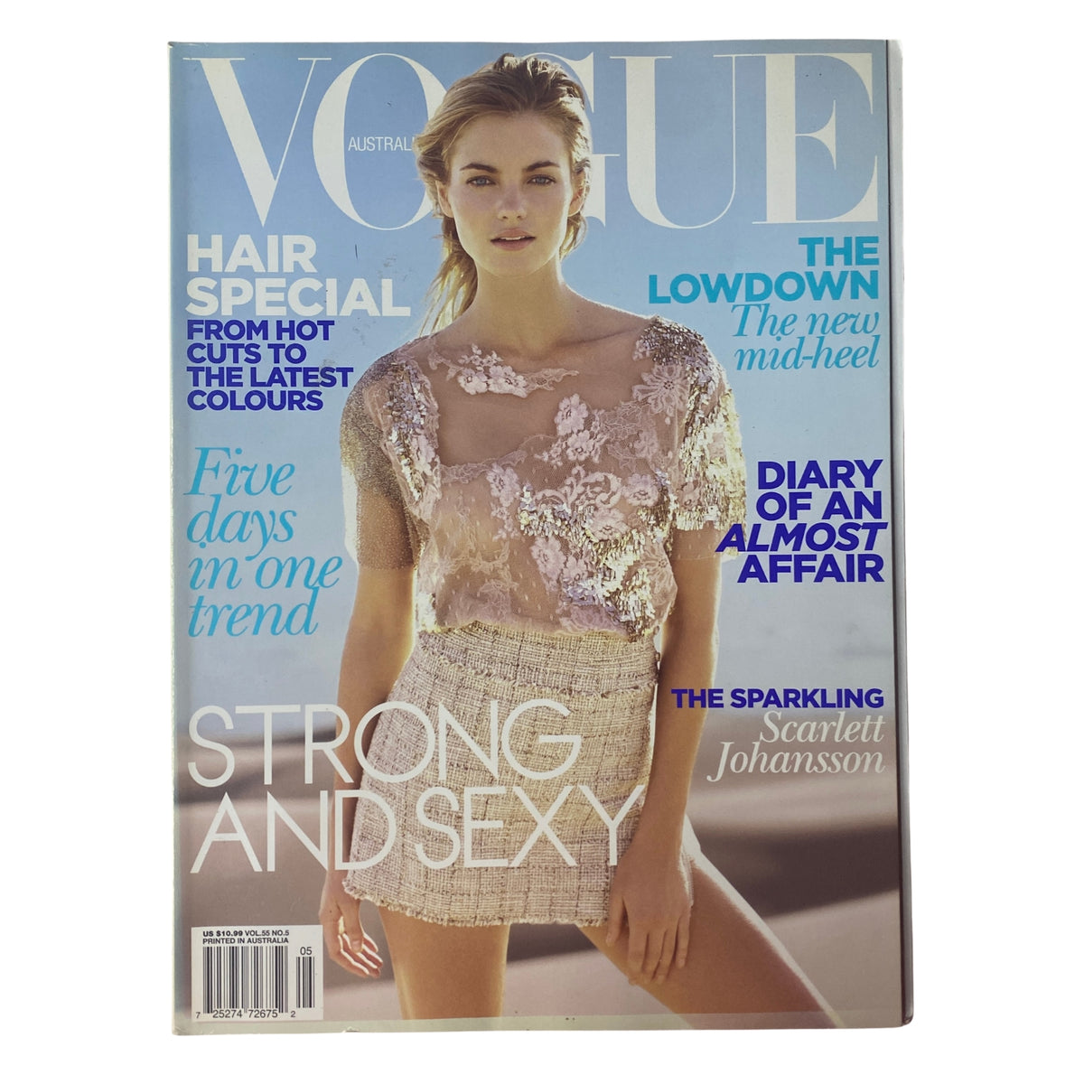 Cover of Vogue Australia Magazine May 2010 featuring Elyse Taylor in a stunning editorial with a neutral-toned outfit, showcasing seasonal fashion and beauty insights.