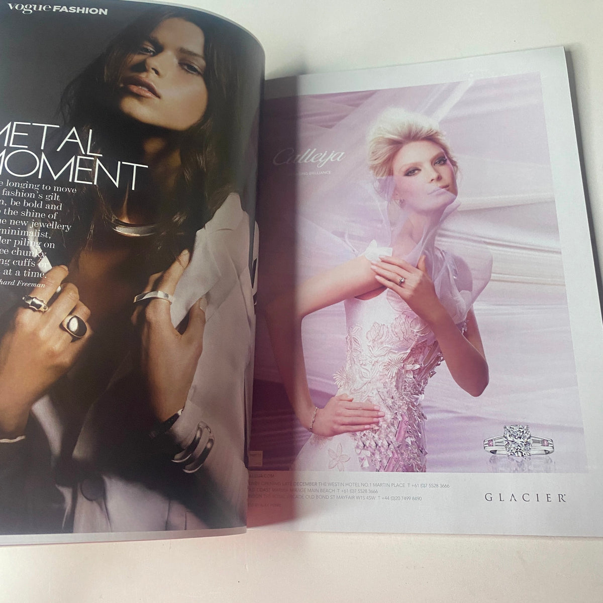 Vogue Australia Magazine January 2010 Catherine McNeil Cover, highlighting a luxurious jewelry advertisement along with a fashion editorial emphasizing chic metal accessories and elegance.