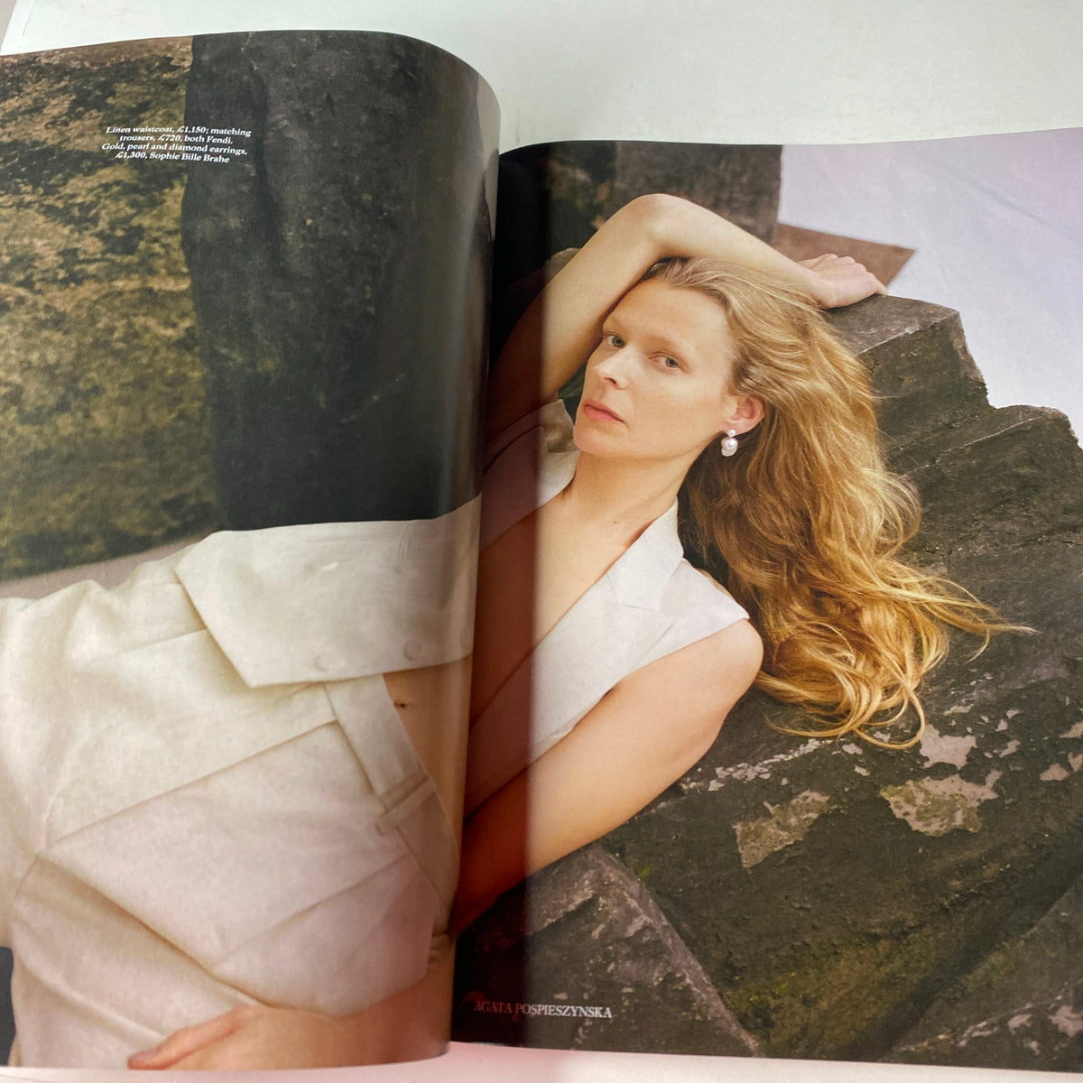 Elegant fashion editorial image from Harper's Bazaar May 2021, depicting a model in natural tones and a serene setting, showcasing sophisticated spring styles.