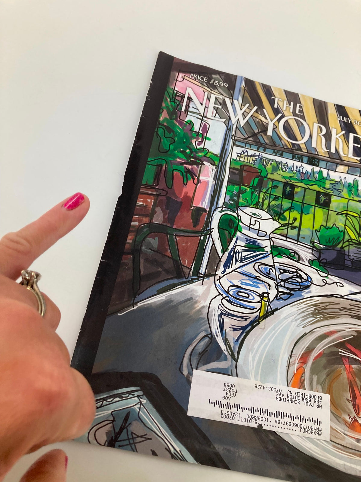 Cover of The New Yorker July 30 2012 titled 'Shaded Terrace' by Javier Mariscal, highlighting an artistic scene with a focus on a table setting and surrounding lush plants.