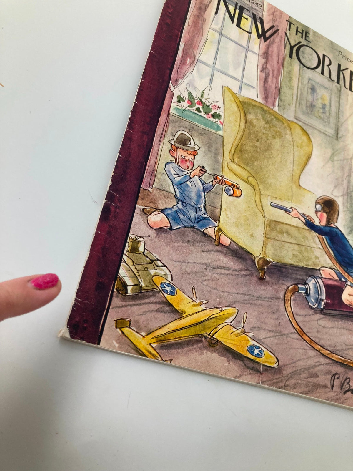 A close-up of The New Yorker Magazine October 10, 1942 highlighting the cover illustration by Perry Barlow, showcasing kids playing with toys.