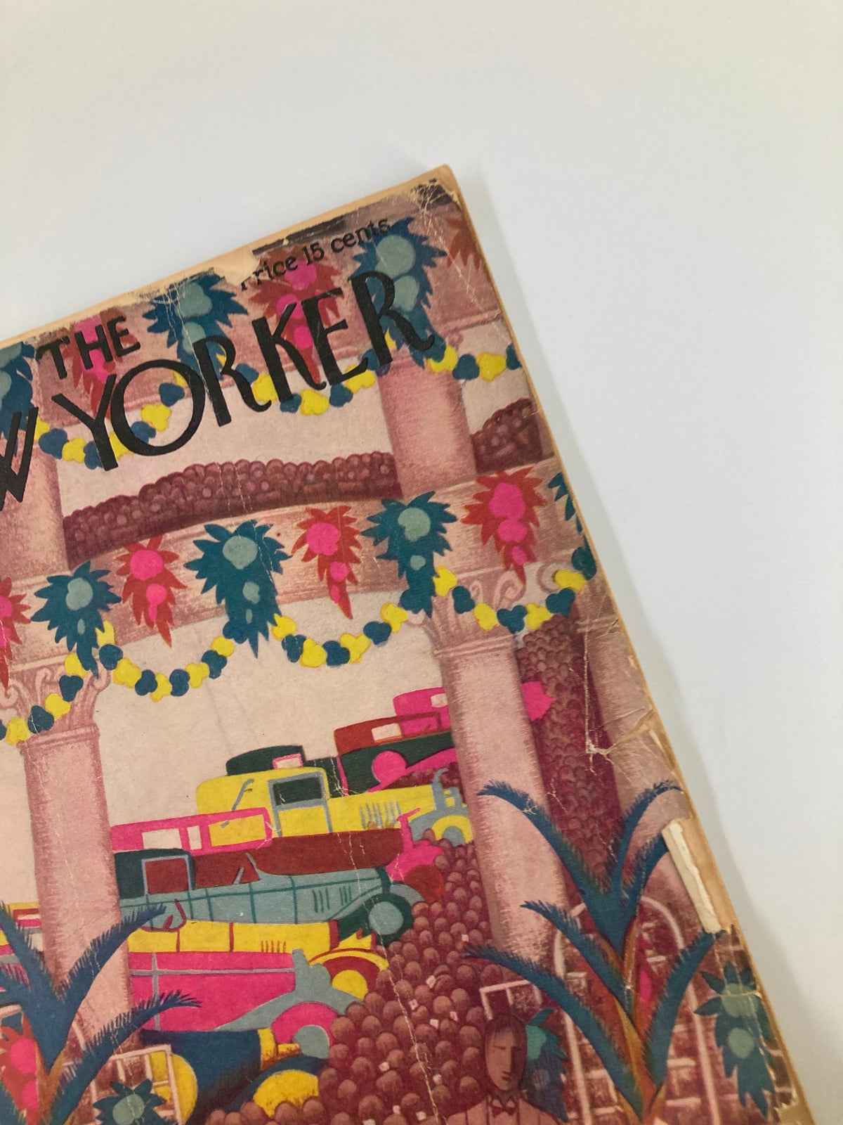 Cover of The New Yorker Magazine January 5, 1929 featuring colorful illustration of parked cars by Sue Williams adorned with floral decorations.