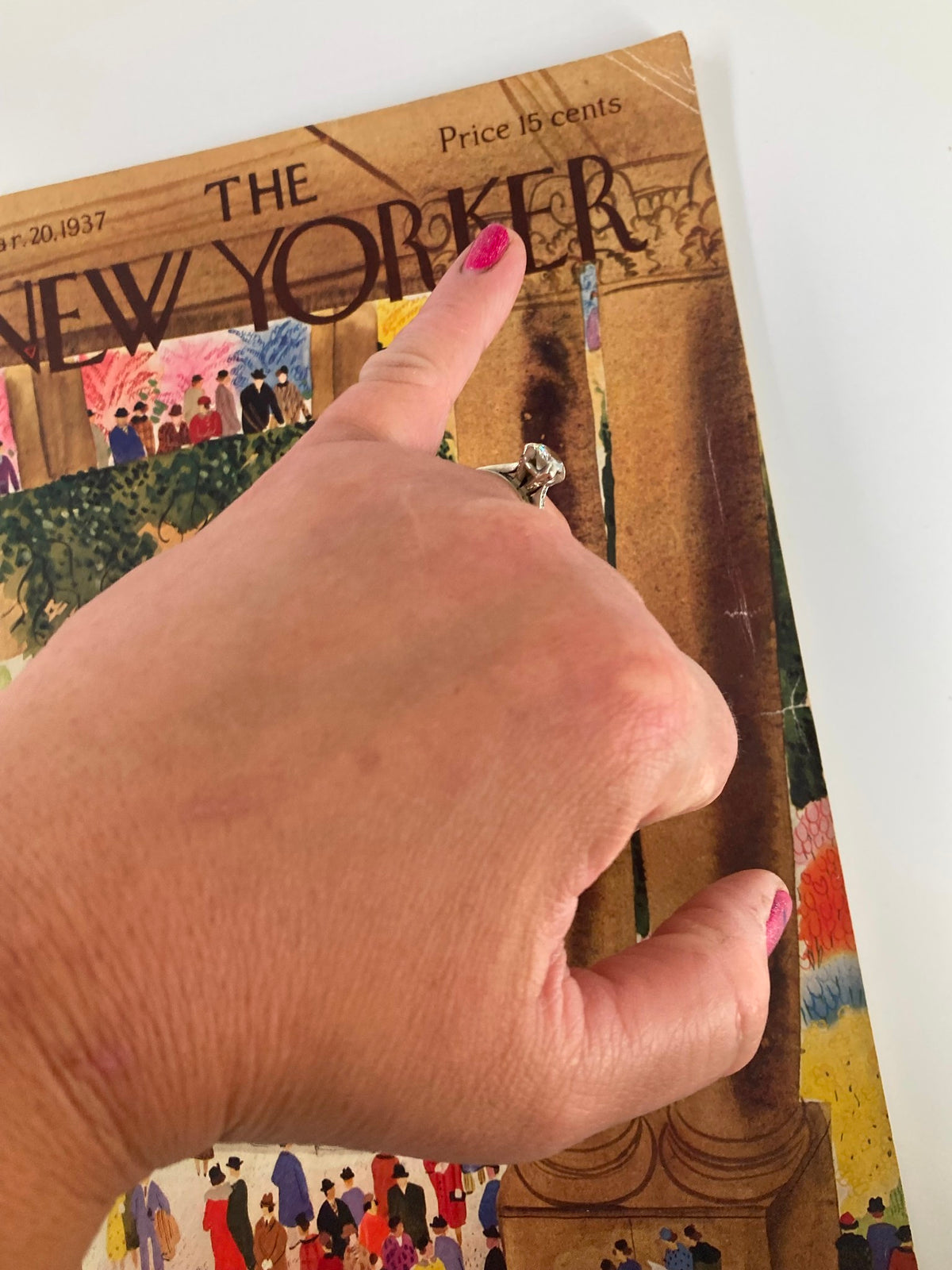 Cover detail of The New Yorker Magazine from March 20, 1937, featuring a hand pointing to the magazine's title and price of 15 cents.