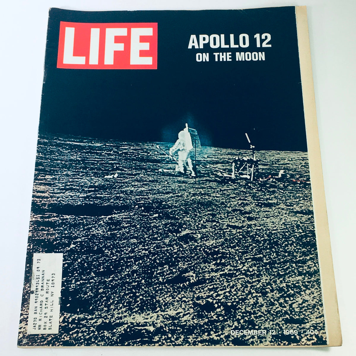VTG Life Magazine December 12 1969 featuring Apollo 12 images, capturing an astronaut on the lunar surface, showcasing historical footage from the moon.