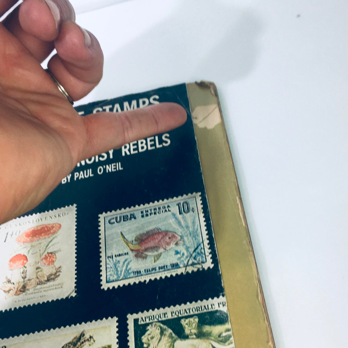 Close-up of the VTG Life Magazine cover from November 30, 1959, showcasing detailed stamps alongside the headline 'Sad But Noisy Rebels' by Paul O'Neil.