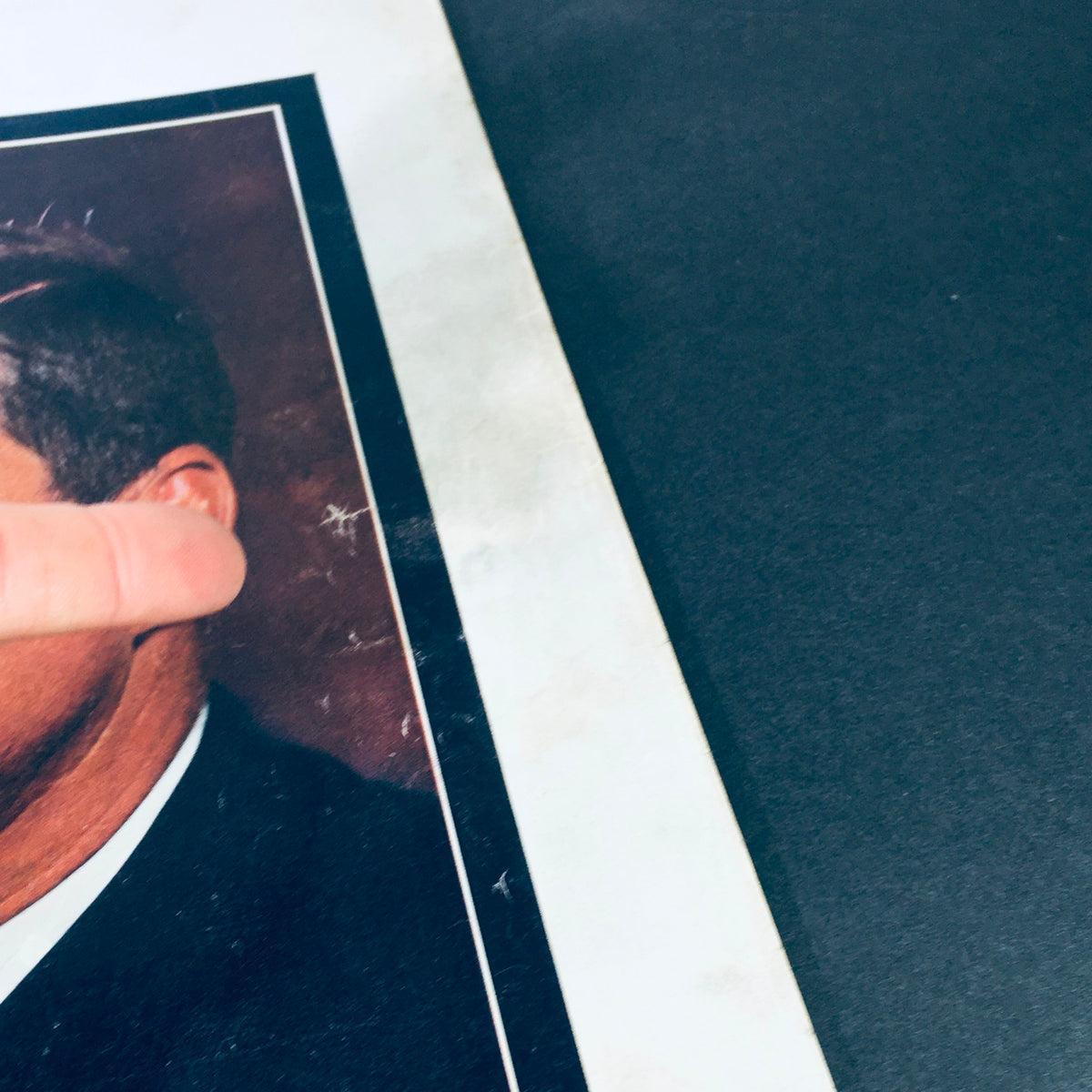 Detailed view of the portrait of John F. Kennedy on the cover of VTG Life Magazine November 29, 1963, showing the quality of the image.