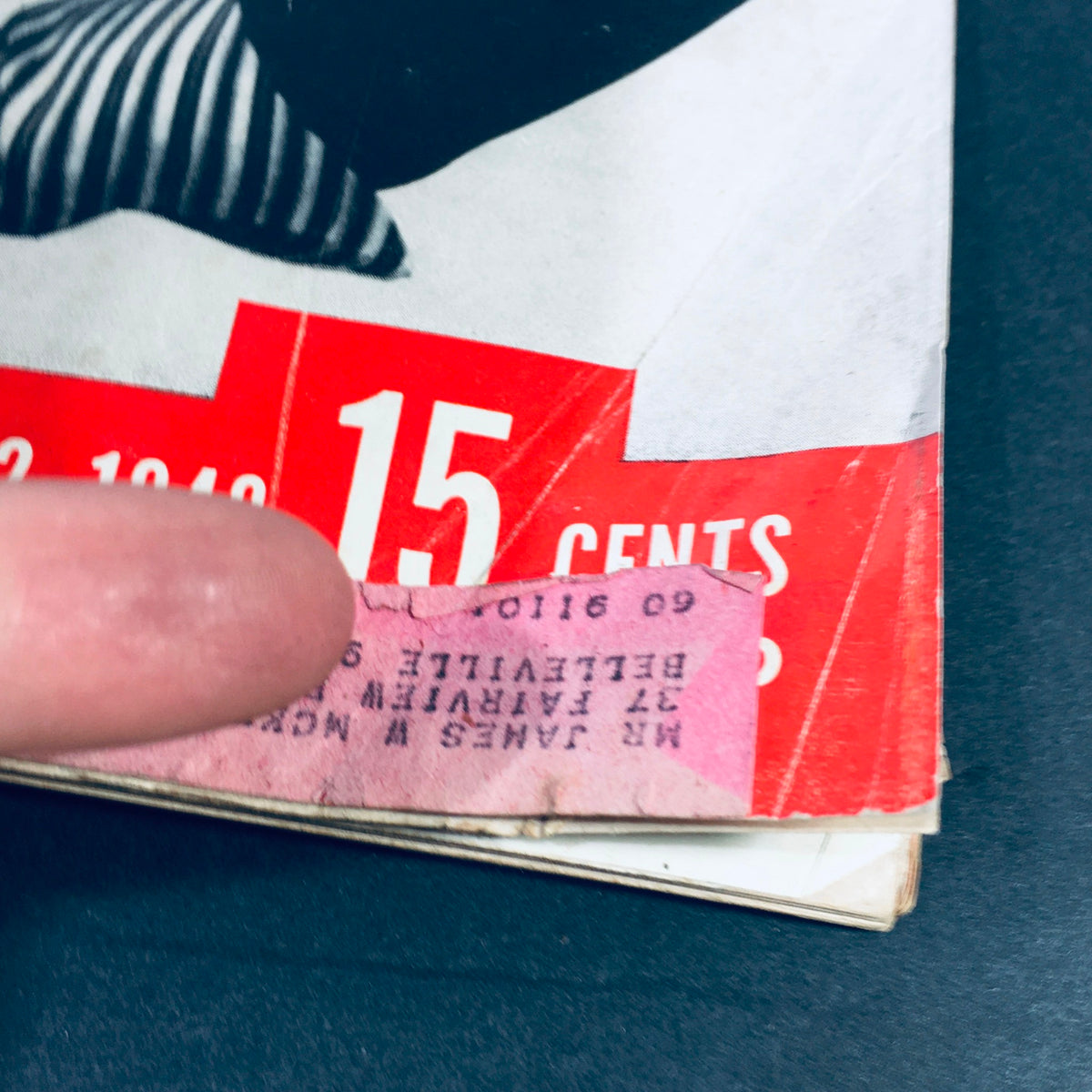 Close-up of the price tag on the vintage Life Magazine January 12, 1948, issue showcasing midwinter accessories. The tag indicates the magazine cost 15 cents.