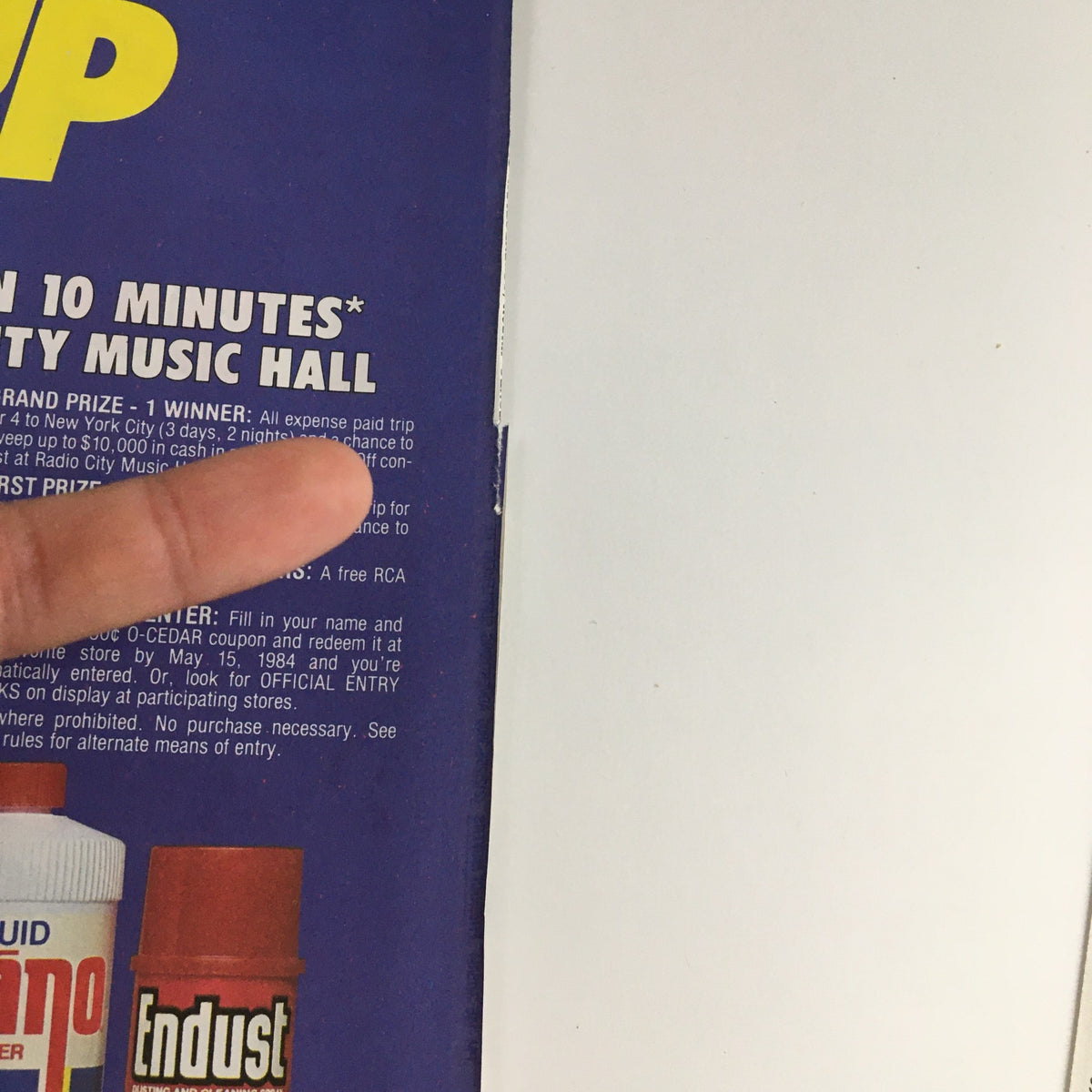 Close-up view of the 1984 Vanish Bowl Brite Toilet Cleaner Circular Coupon Advertisement, highlighting contest details, including the chance to win a trip to Radio City Music Hall and the entry requirements.