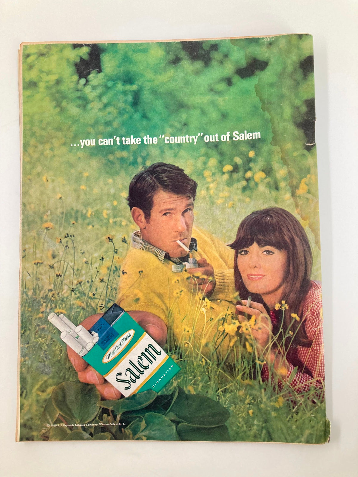 Back cover of the vintage Sports Illustrated magazine from June 22, 1970 featuring an advertisement for Salem cigarettes. The nostalgic ad highlights a couple outdoors, capturing the culture of the 1970s.