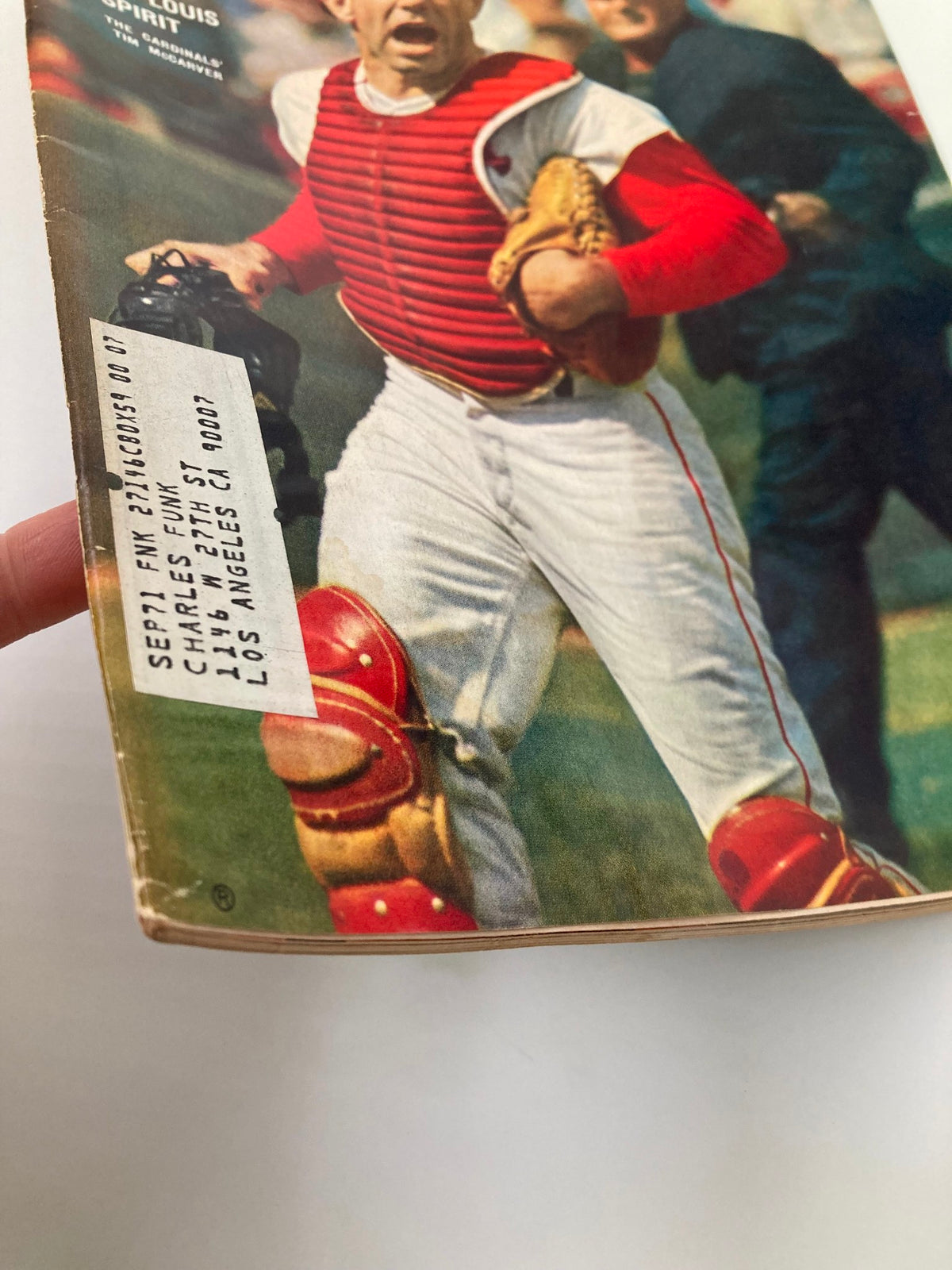 Vintage Sports Illustrated Magazine September 4, 1967, featuring Tim McCarver of the St. Louis Cardinals on the cover, showcasing a close-up of the magazine's side with a price sticker.
