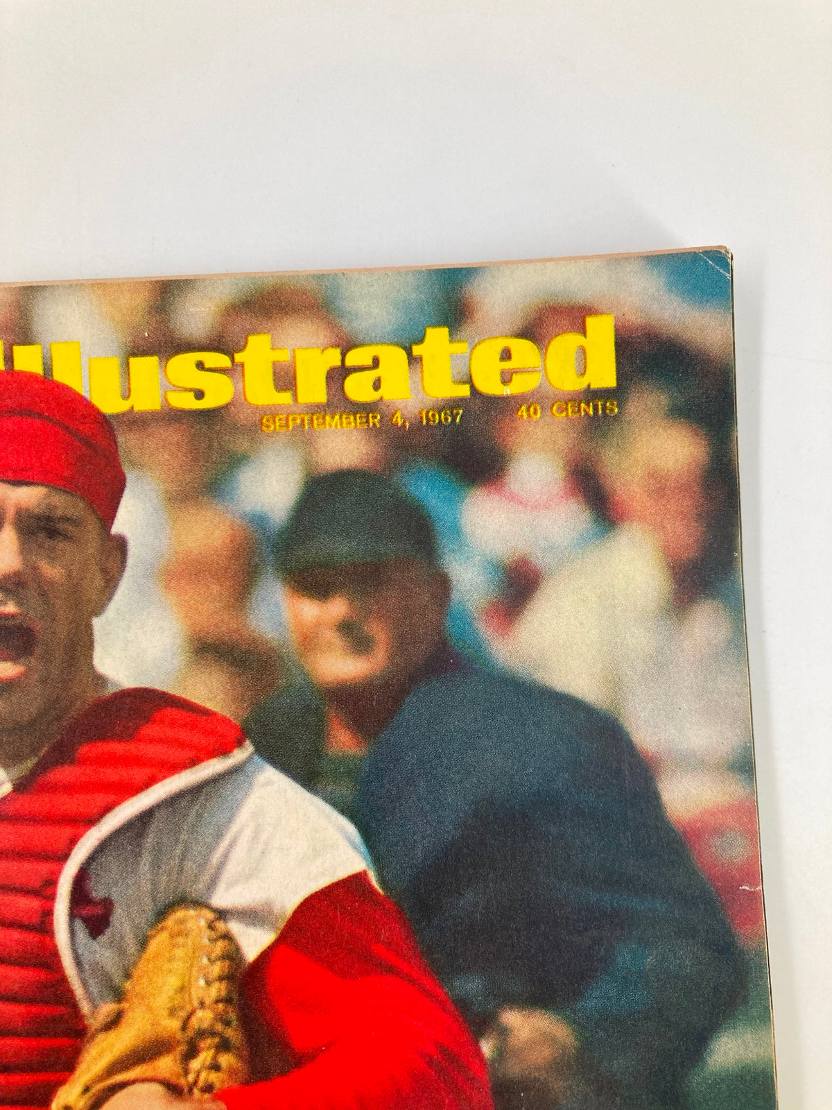 Cover of the Vintage Sports Illustrated Magazine from September 4, 1967, displaying Tim McCarver and captivating baseball imagery.