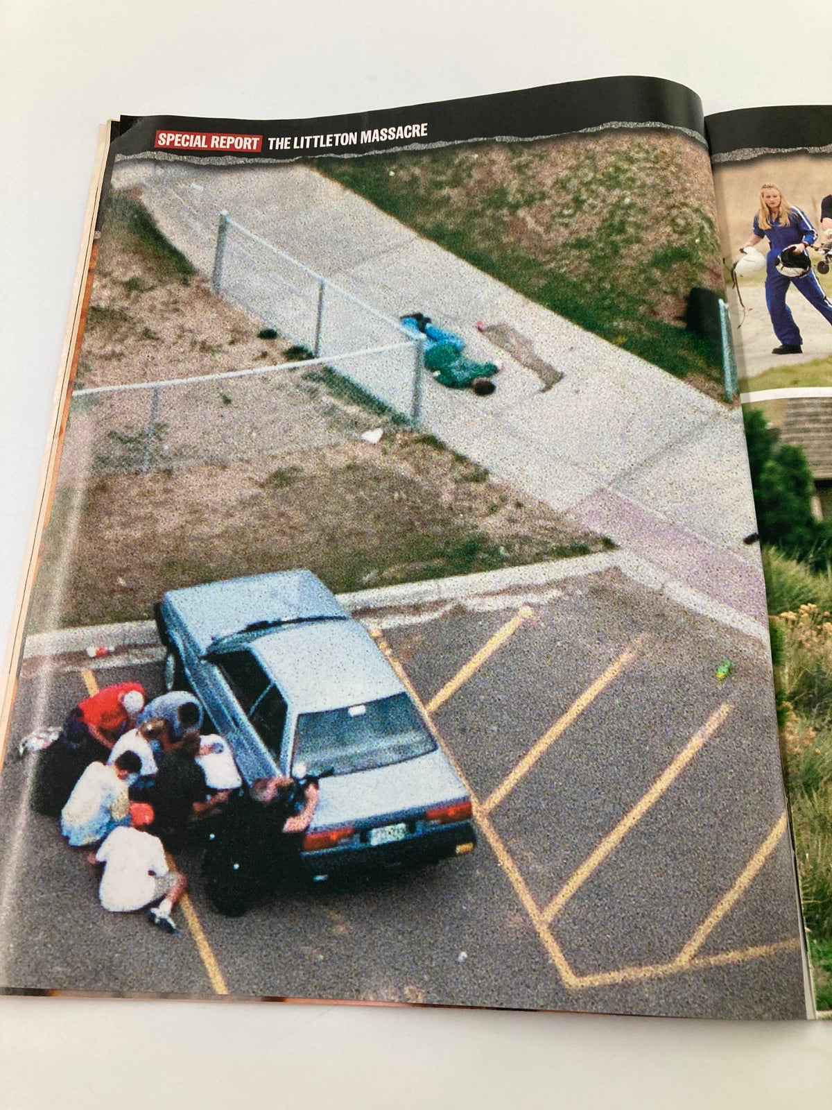 Time Magazine May 3, 1999, presenting an aerial view of the Columbine shooting scene, depicting the immediate aftermath of the violence.