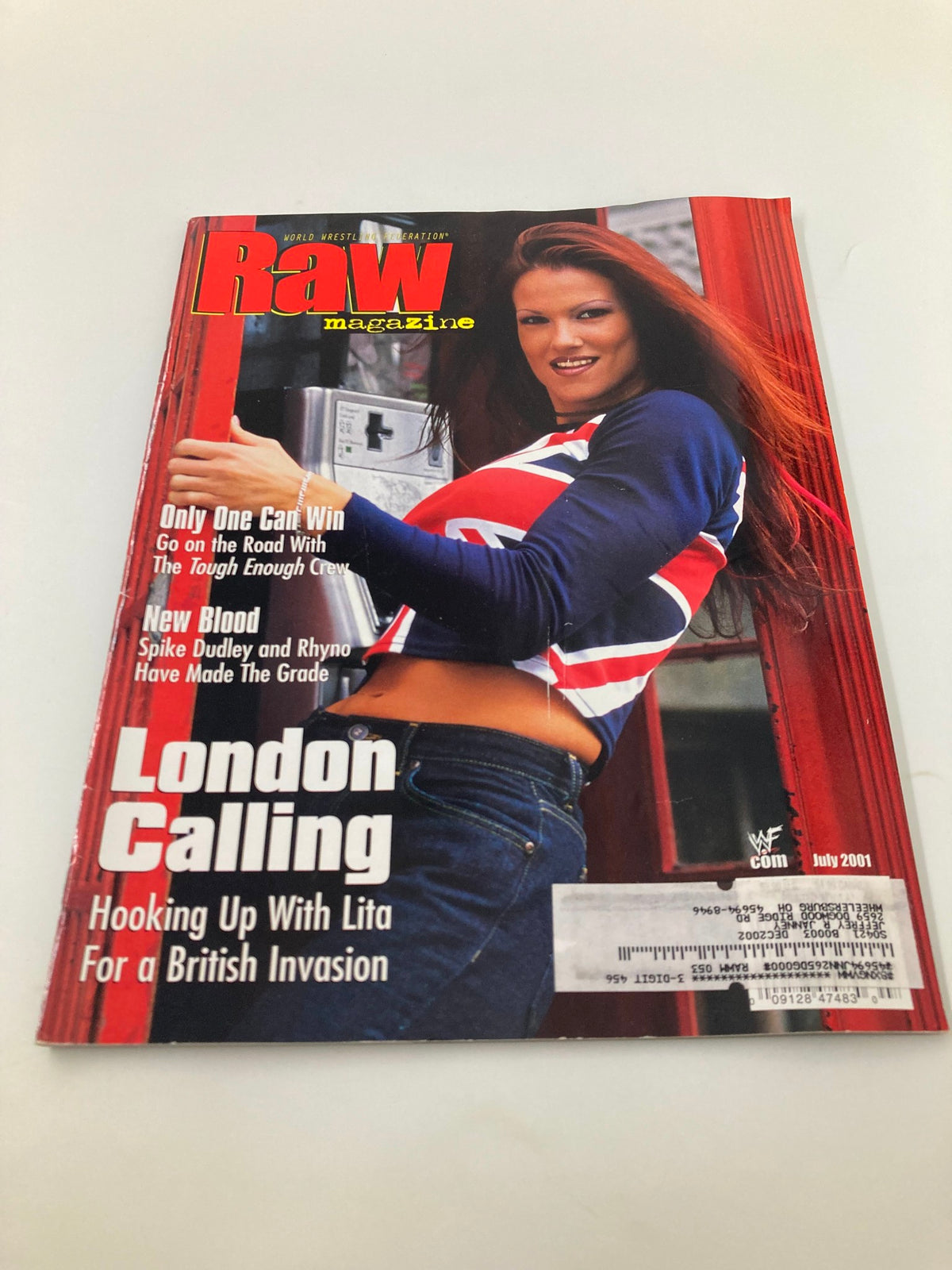 Close-up view of WWF Raw Magazine July 2001 cover with Lita, highlighting the bold title 'London Calling' and her dynamic pose.