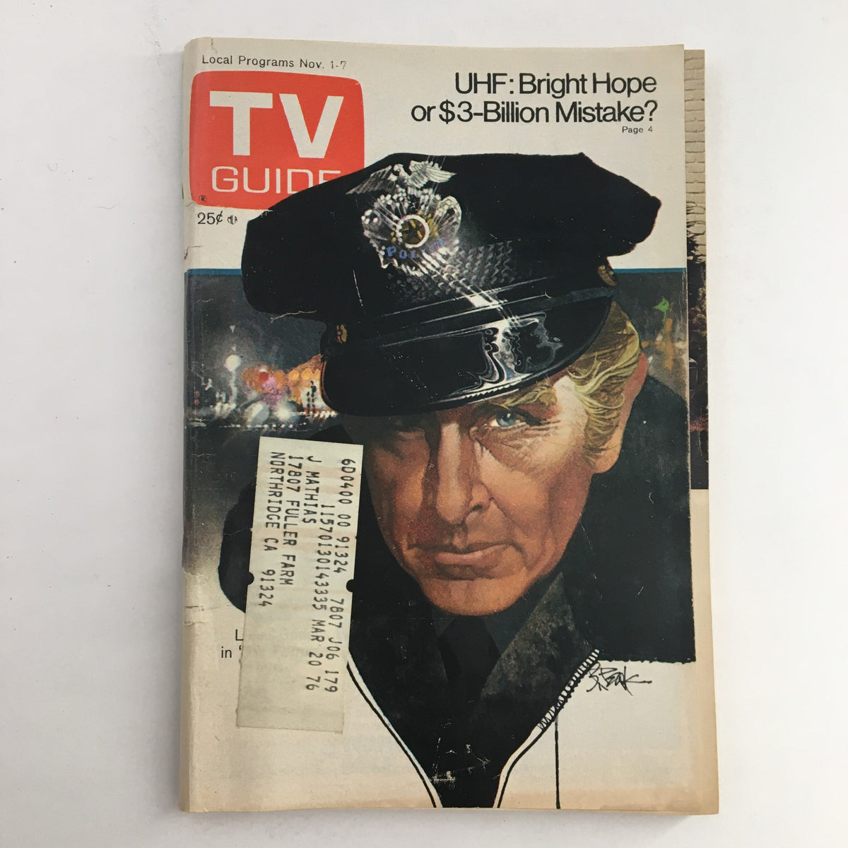 Cover of TV Guide Magazine November 1 1975 featuring Lloyd Bridges in 'Hot Shots!' with police officer illustration. A nostalgic collectible for vintage magazine fans.