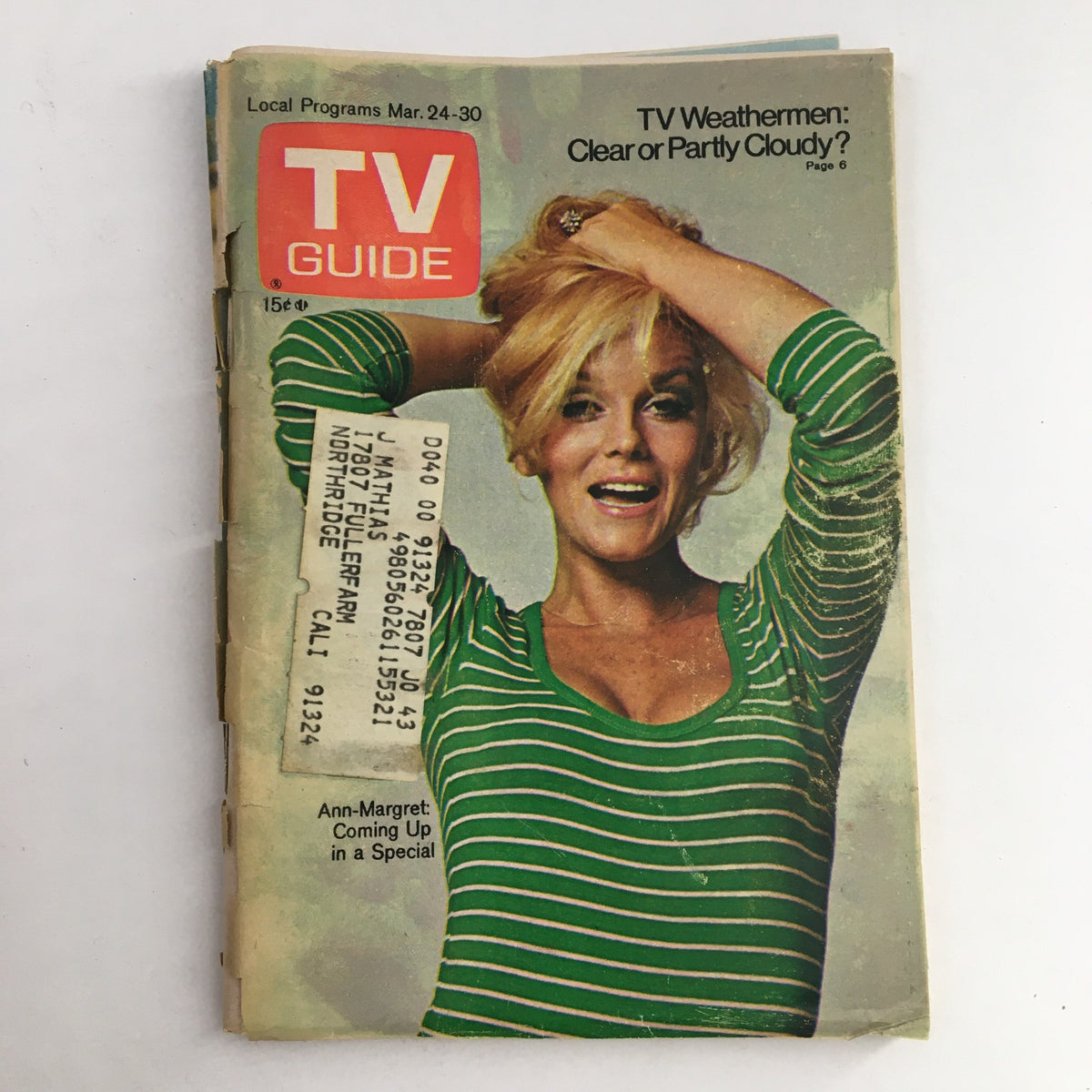 Cover of TV Guide Magazine March 24, 1973 featuring Ann-Margret in a green striped top, discussing the upcoming television schedule and weather conditions.