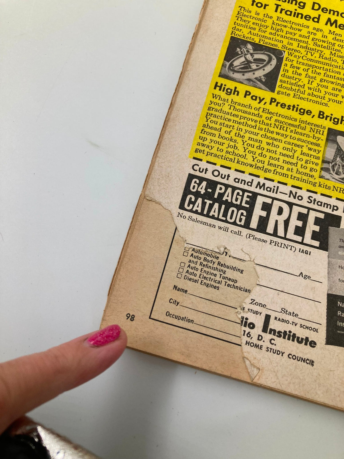Back cover of Men Magazine January 1961 showing advertisements and wear, part of the collectible issue featuring 'The Maine Adventurer Who Became a Maori Chieftain'.