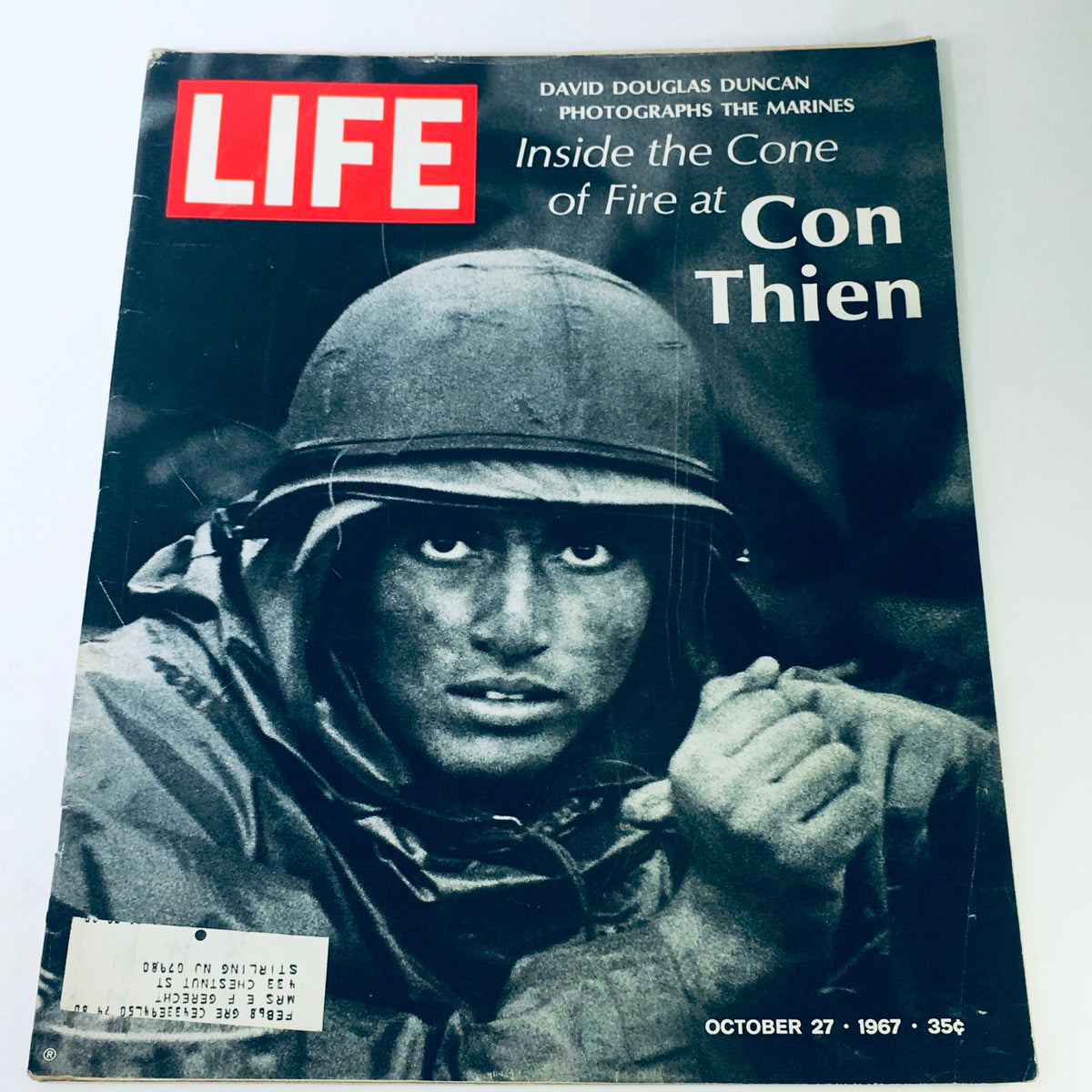 Cover of Vintage Life Magazine dated October 27, 1967, featuring a photograph by David Douglas Duncan of a Marine, reflecting military life during the Vietnam War era.