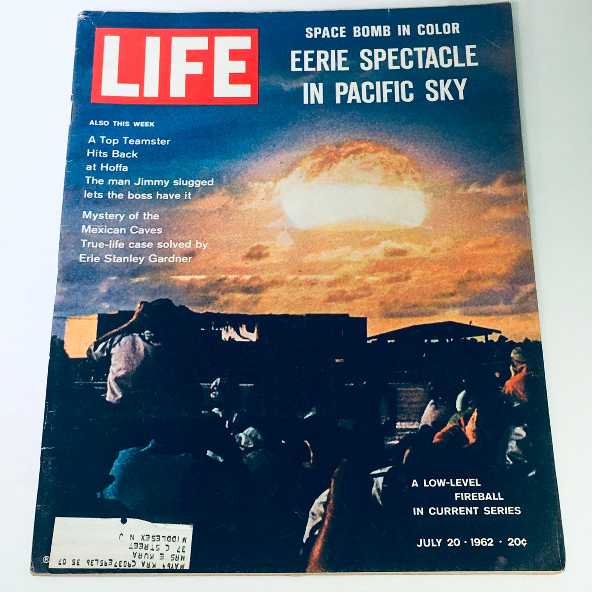 Vintage Life Magazine cover from July 20, 1962, featuring the title 'Space Bomb Color: Eerie Spectacle in Pacific Sky.' The cover showcases a dramatic image of a fireball in the sky, representative of 1960s space exploration themes. This collectible magazine illustrates historical interests in aerial phenomena.