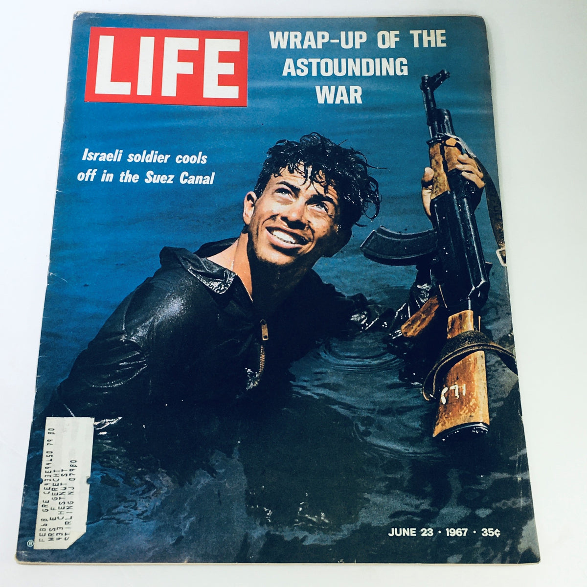 Cover of VTG Life Magazine June 23 1967 showcasing an Israeli soldier cooling off in the Suez Canal with a rifle, featuring the headline 'Wrap-Up Of The Astounding War.'